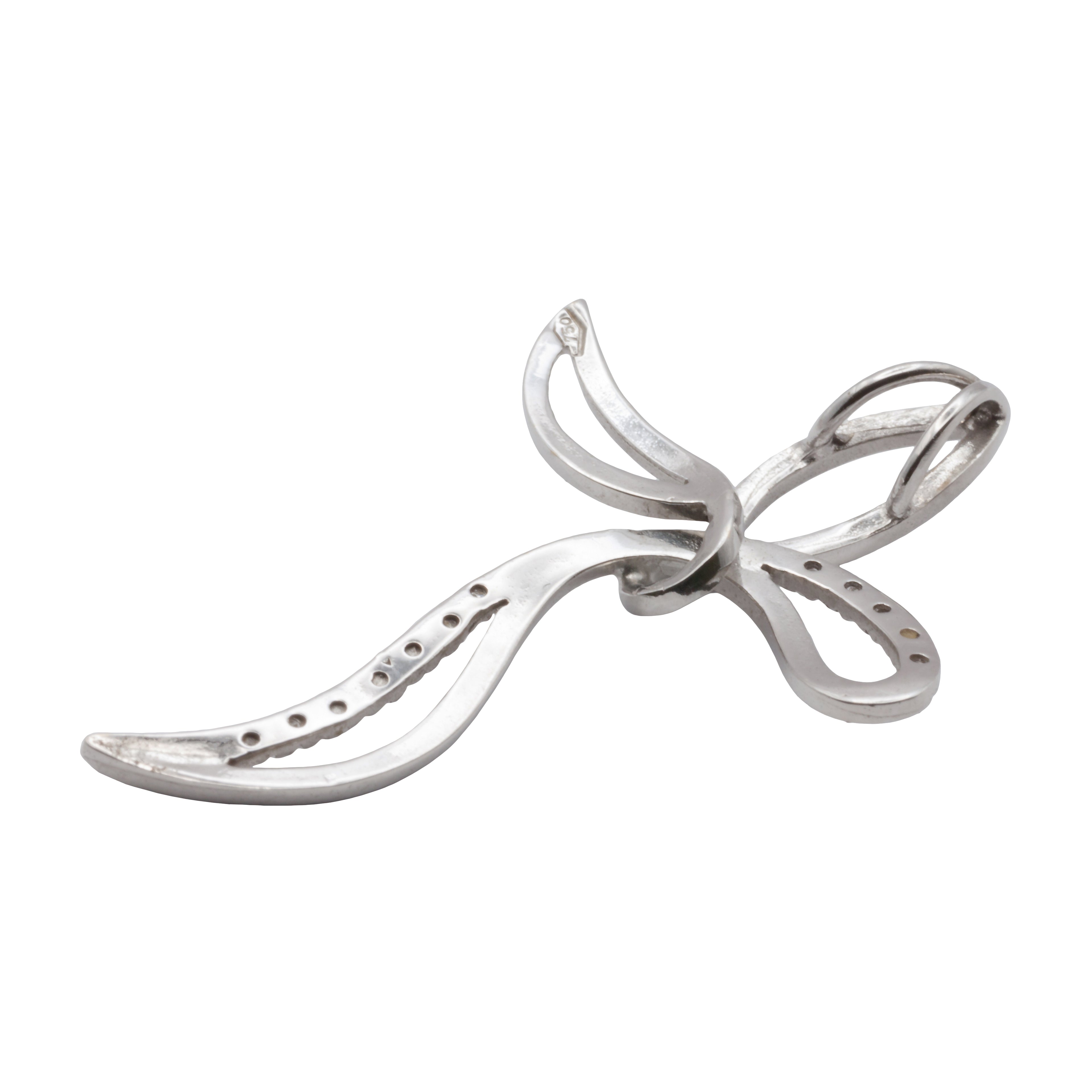 A 9ct white gold cubic zirconia cross pendant