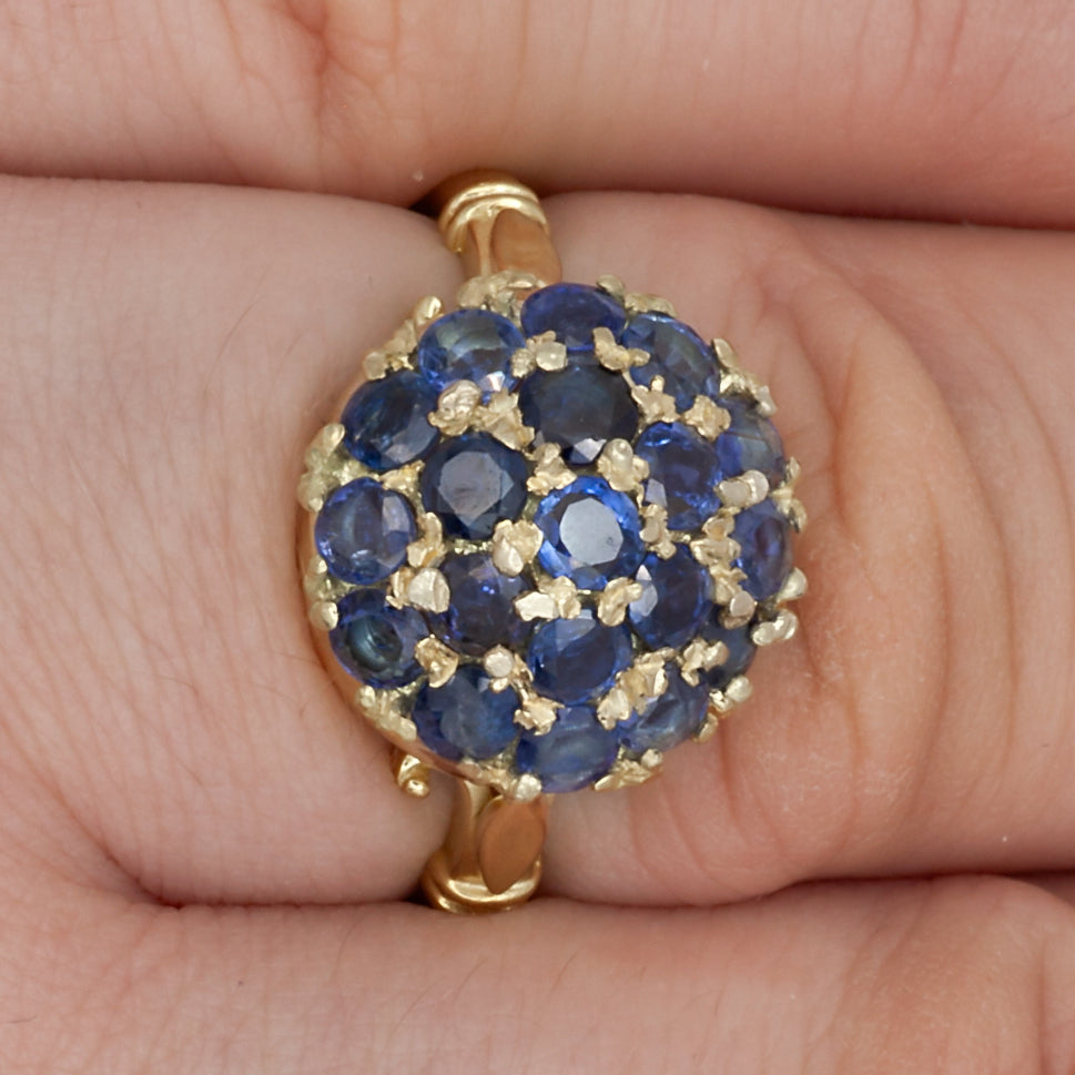 A vintage sapphire cluster ring