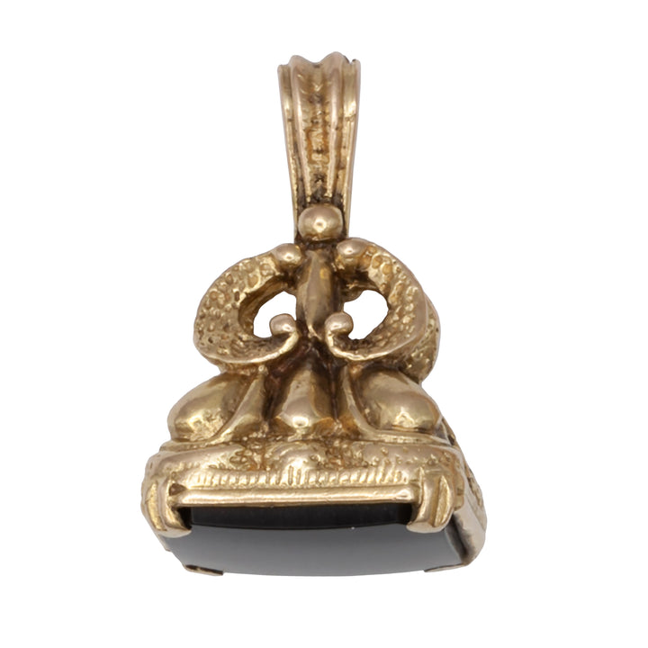An Antique 9ct gold onyx fob