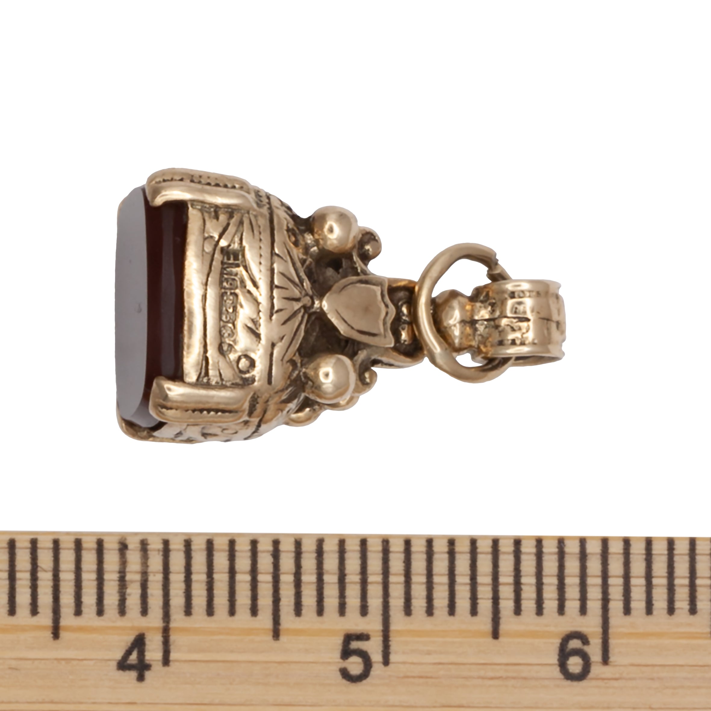 An antique 9ct gold cornelian fob