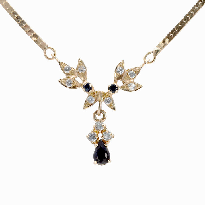 A 14ct gold sapphire and spinel necklace.
