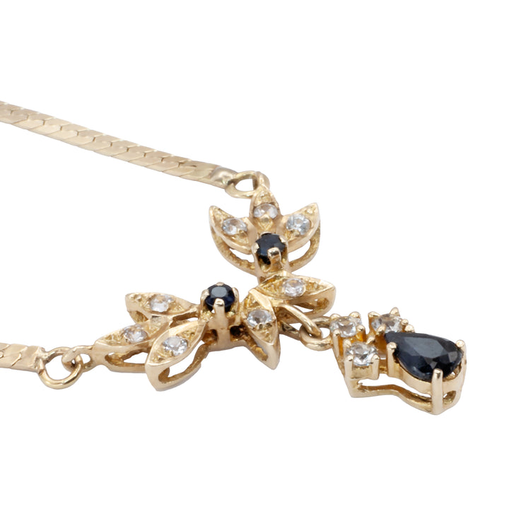 A 14ct gold sapphire and spinel necklace.