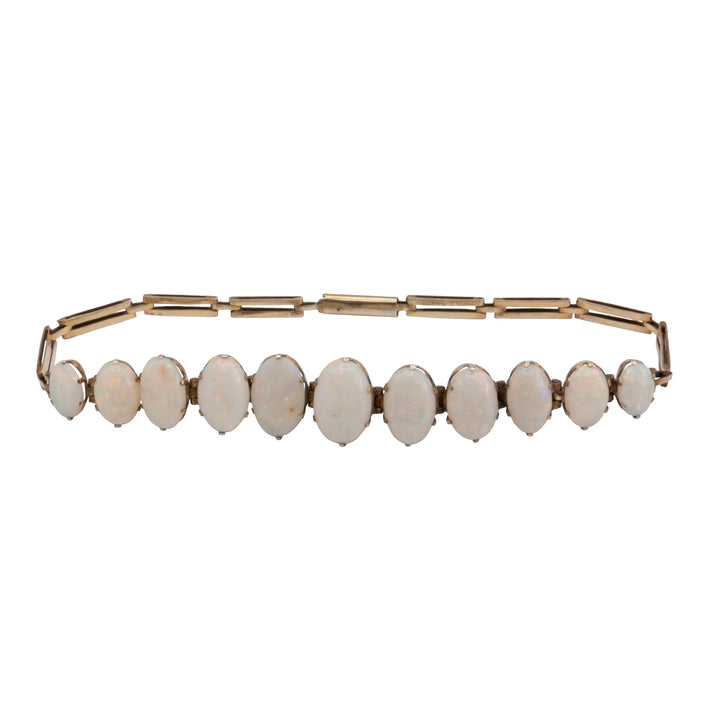 An Antique Edwardian 9ct gold opal bracelet.