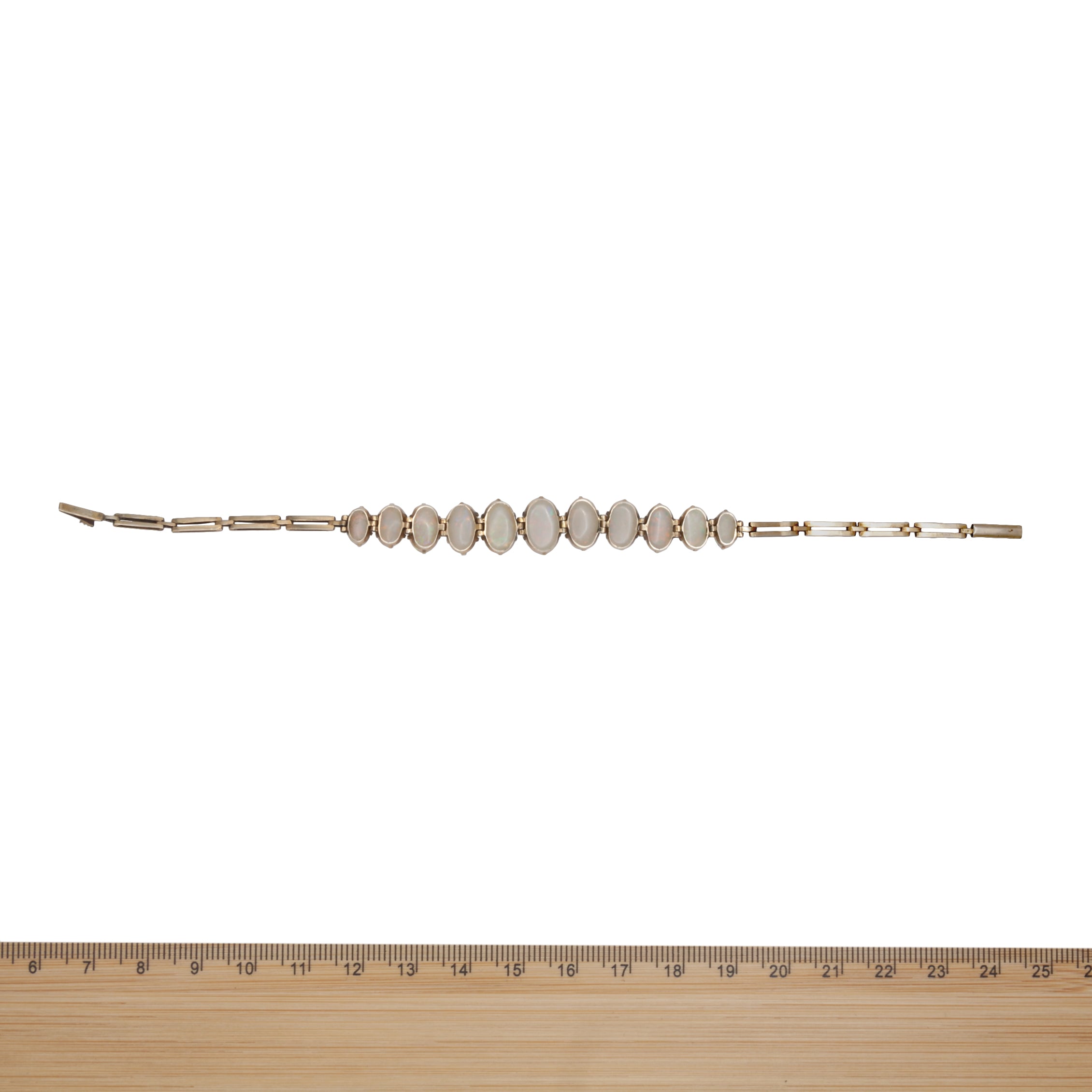 An Antique Edwardian 9ct gold opal bracelet.