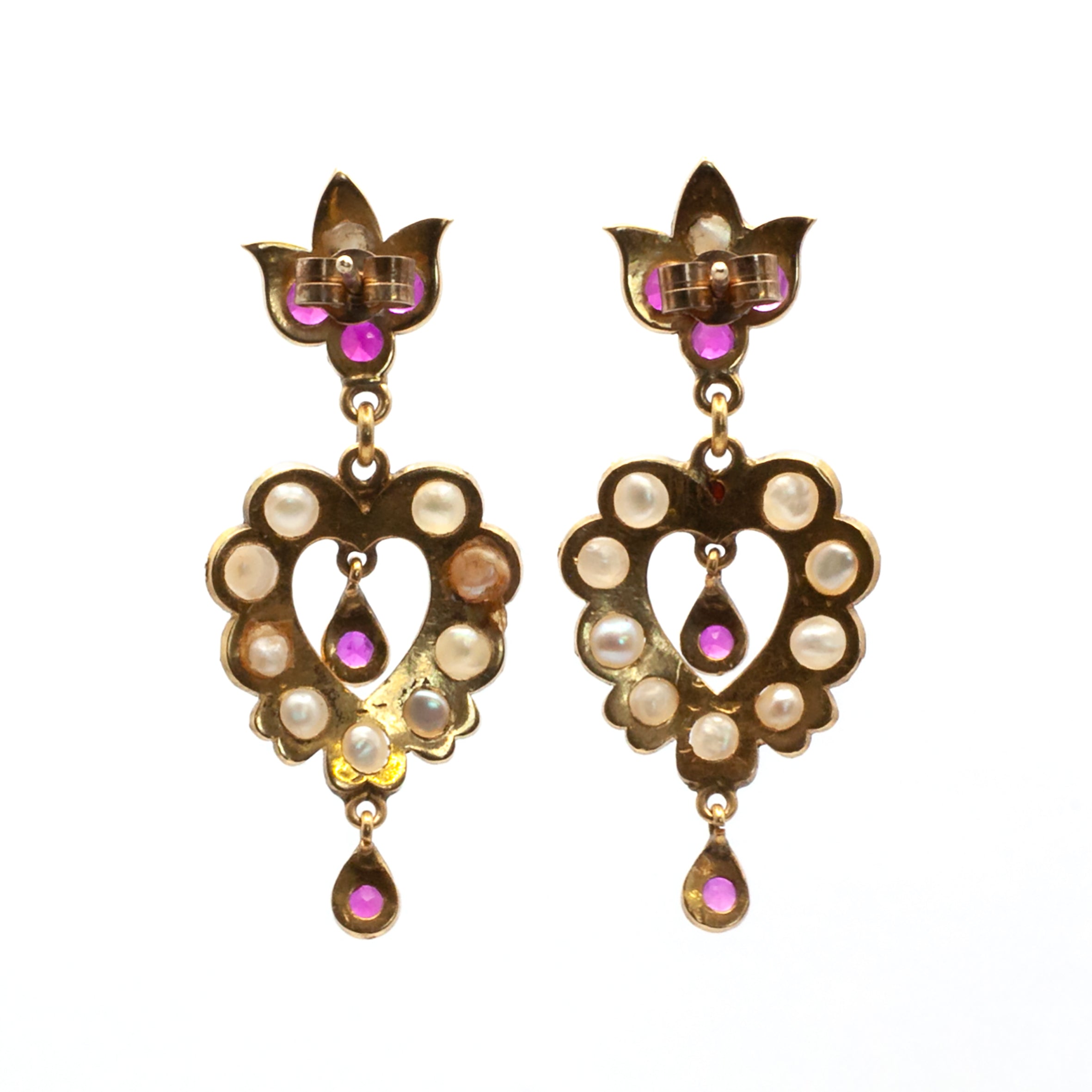 An antique pair of 9ct gold ruby and seed pearl earrings