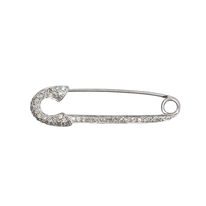 An antique 18ct white gold diamond safety pin brooch.