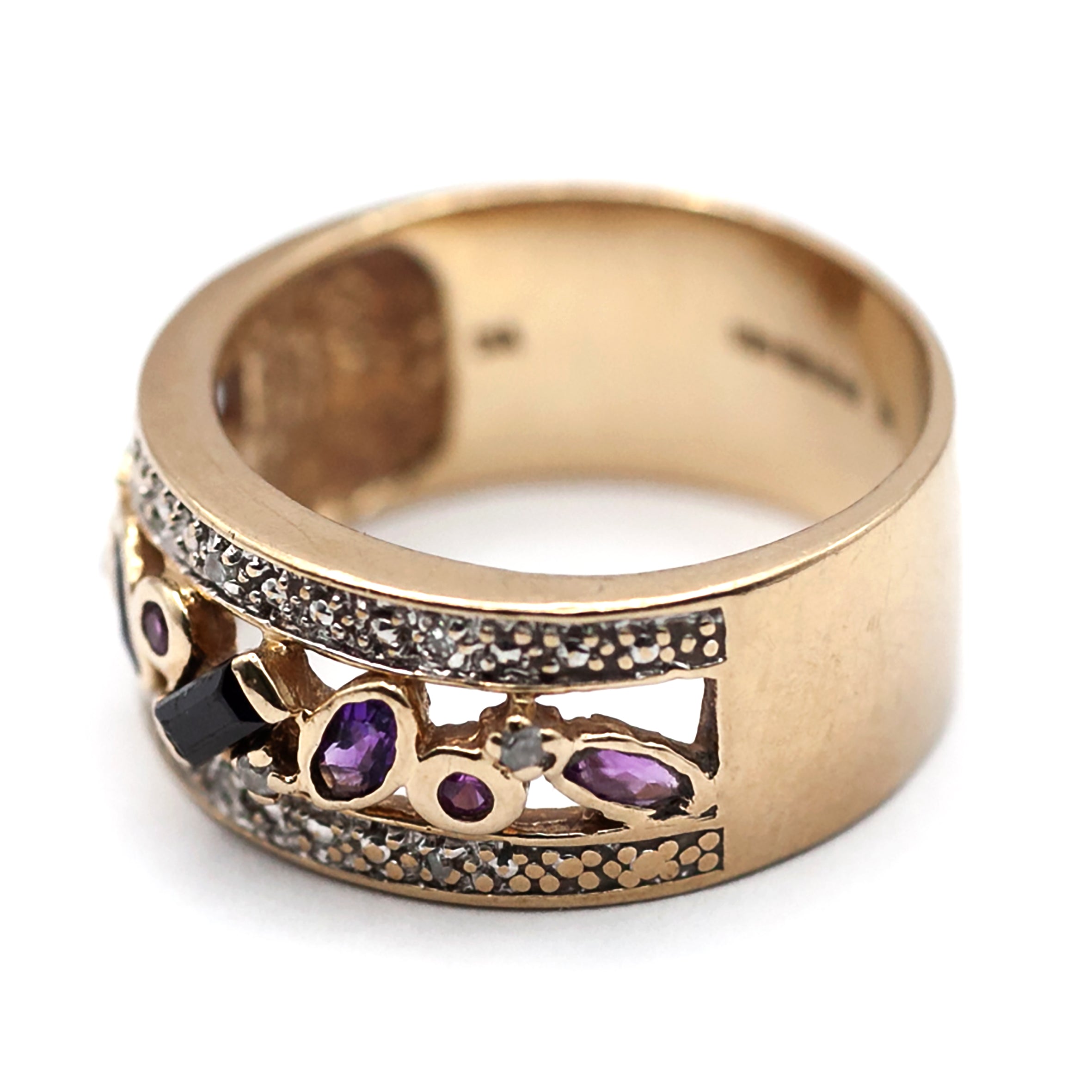 A 9ct gold multi gemstone, and diamond ring