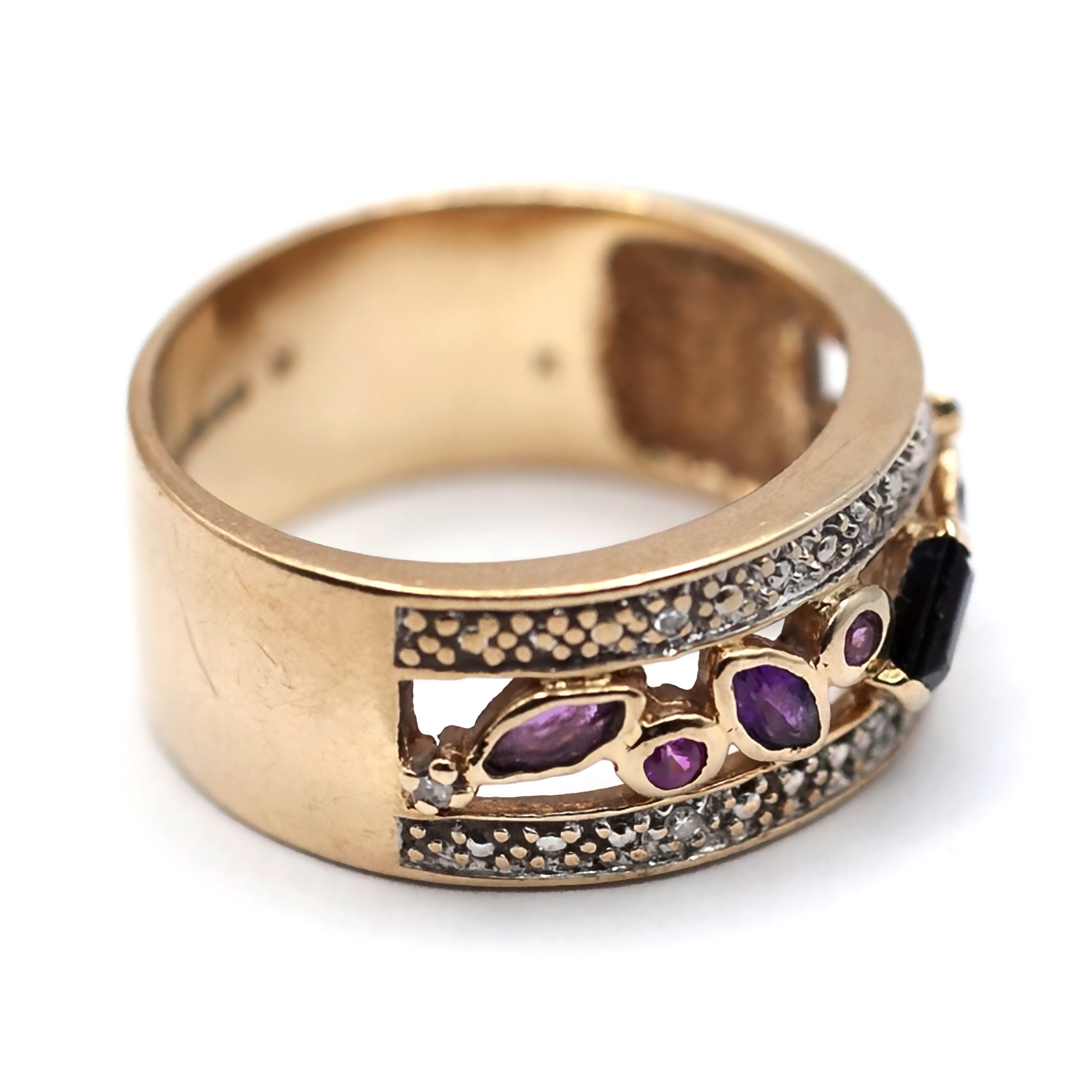 A 9ct gold multi gemstone, and diamond ring