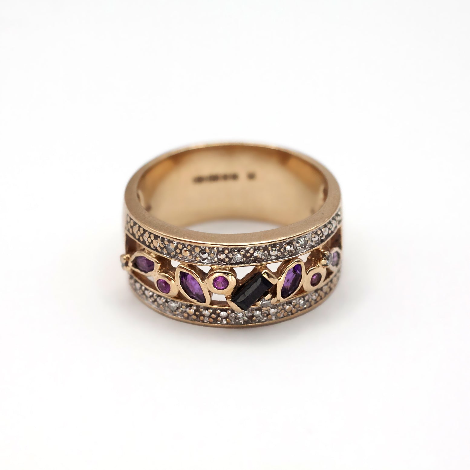 A 9ct gold multi gemstone, and diamond ring