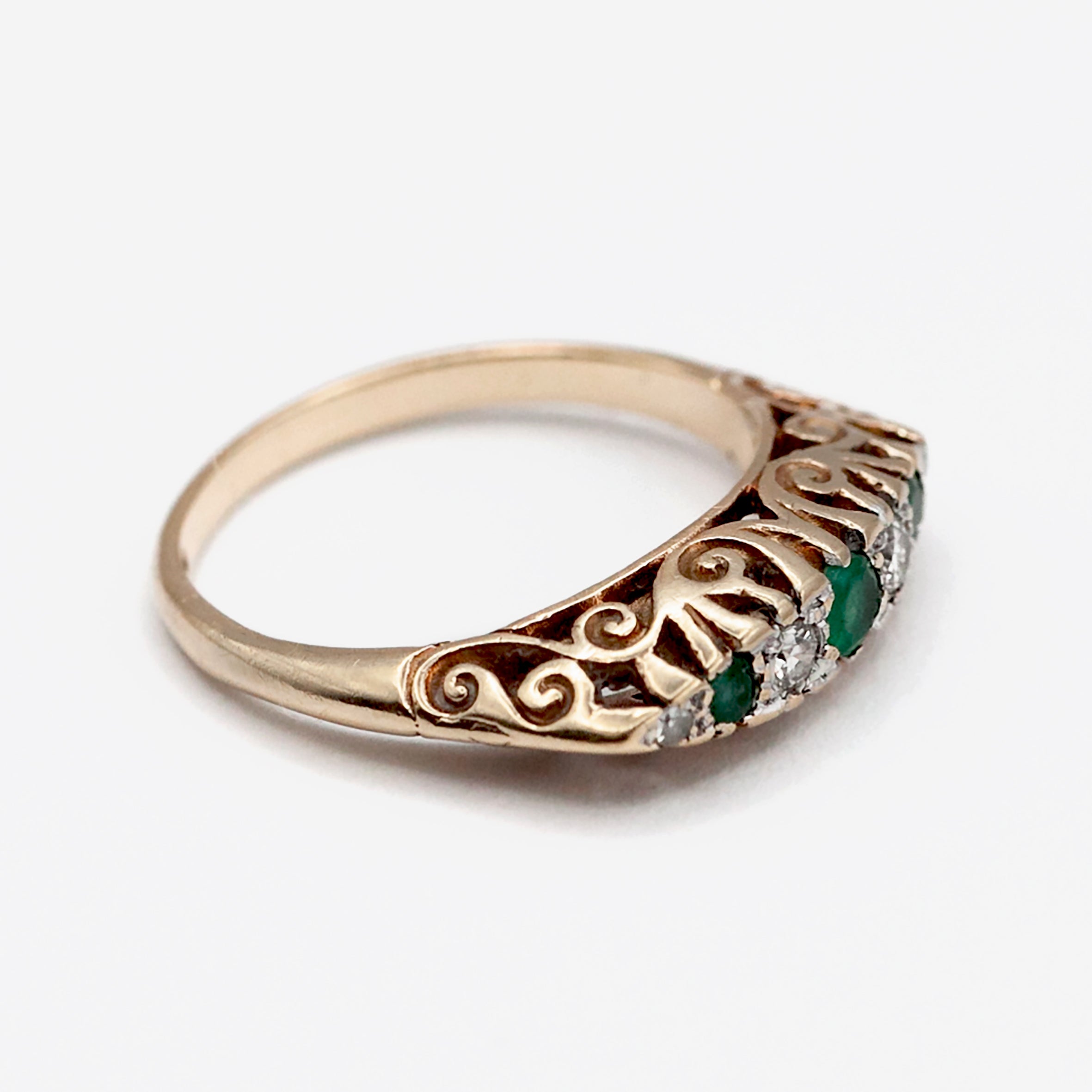 A 9ct gold Edwardian style emerald, and diamond ring