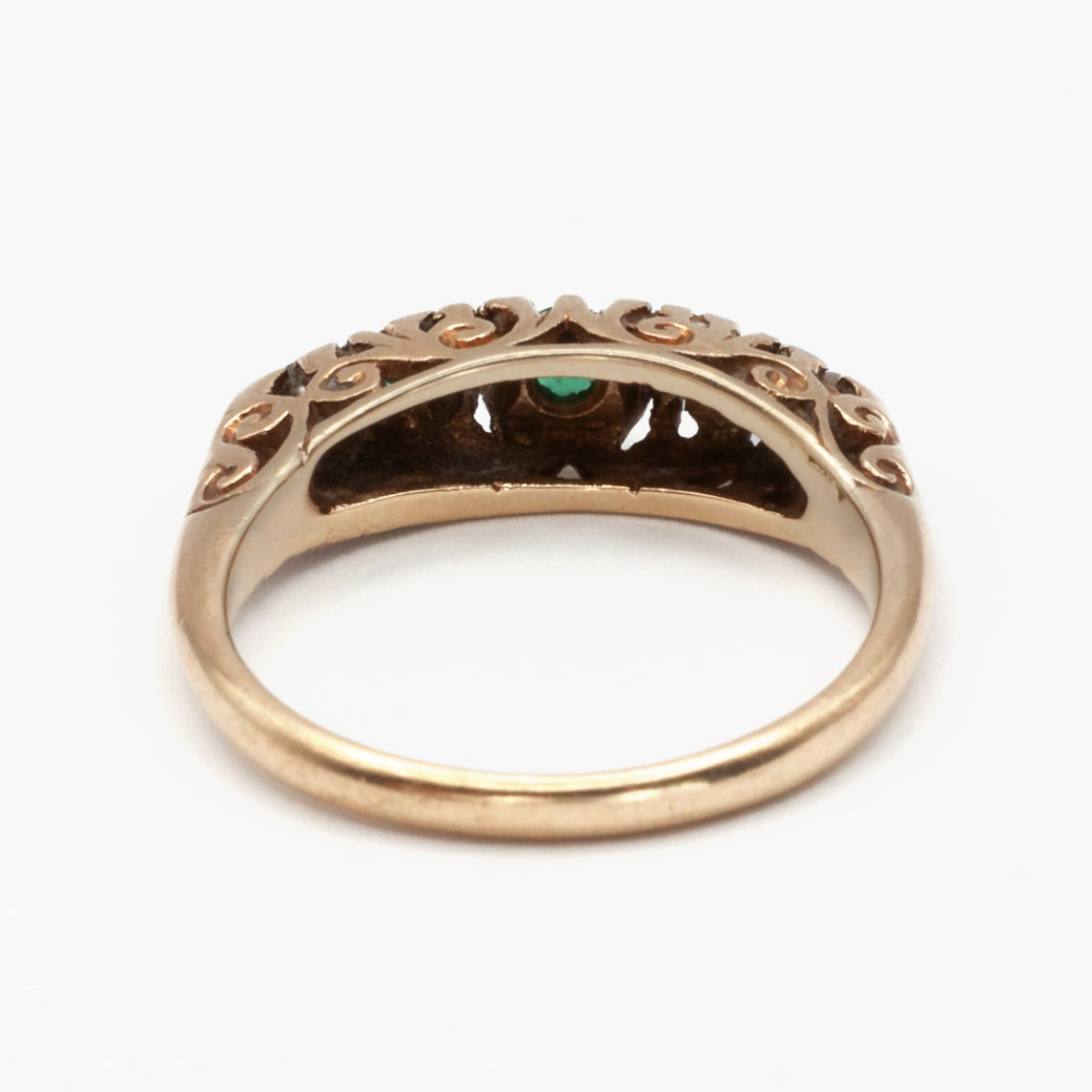 A 9ct gold Edwardian style emerald, and diamond ring