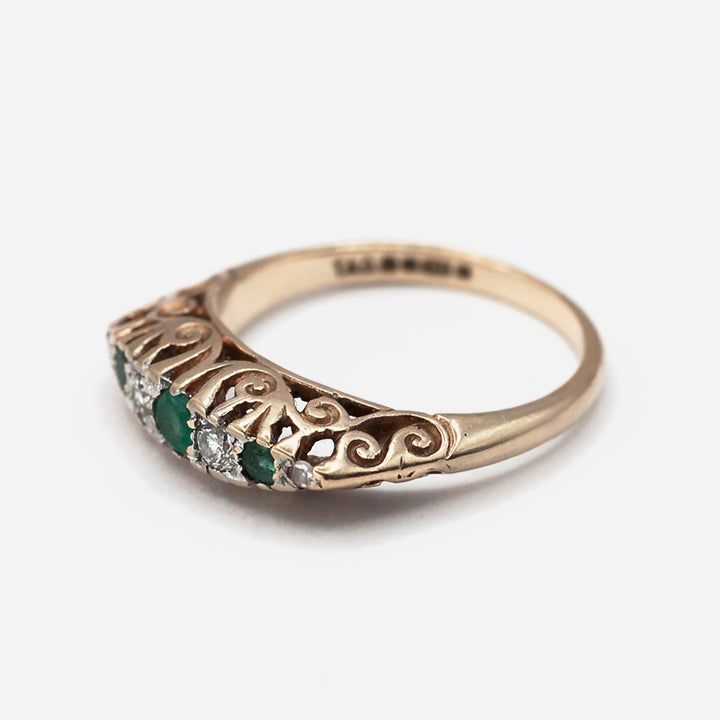 A 9ct gold Edwardian style emerald, and diamond ring