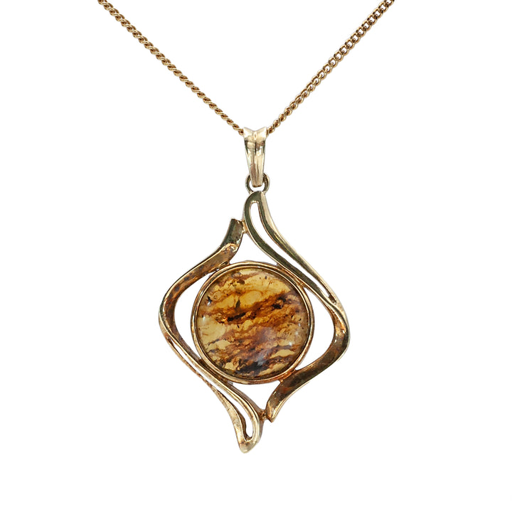 A vintage 14ct gold amber pendant.
