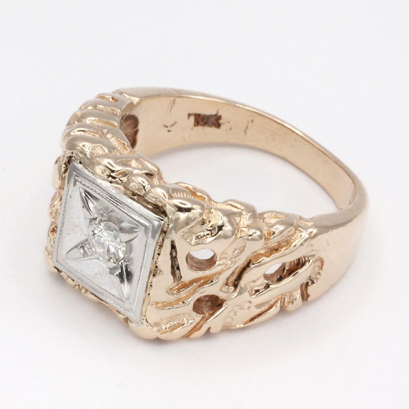 A 10ct heavy gold diamond signet ring