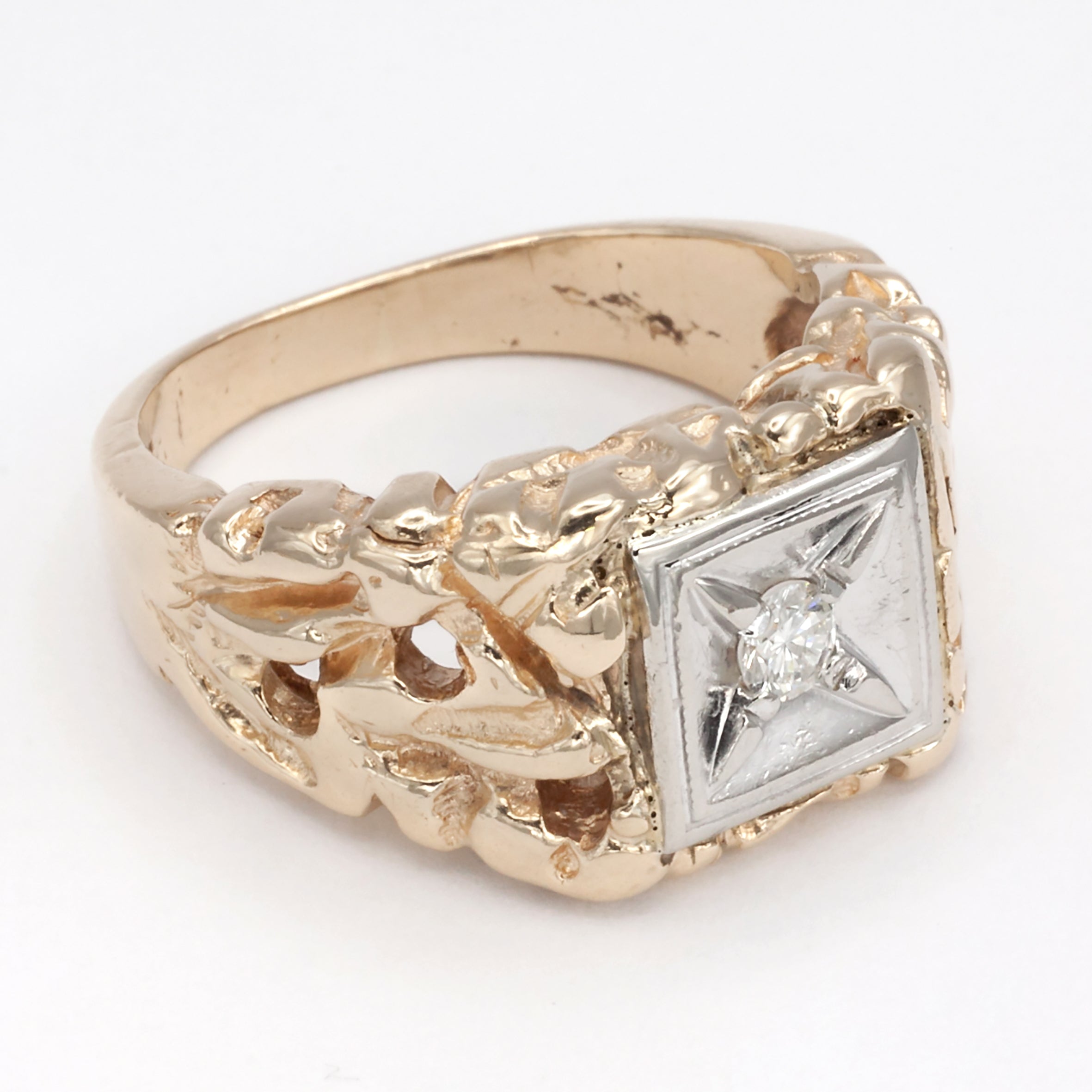A 10ct heavy gold diamond signet ring