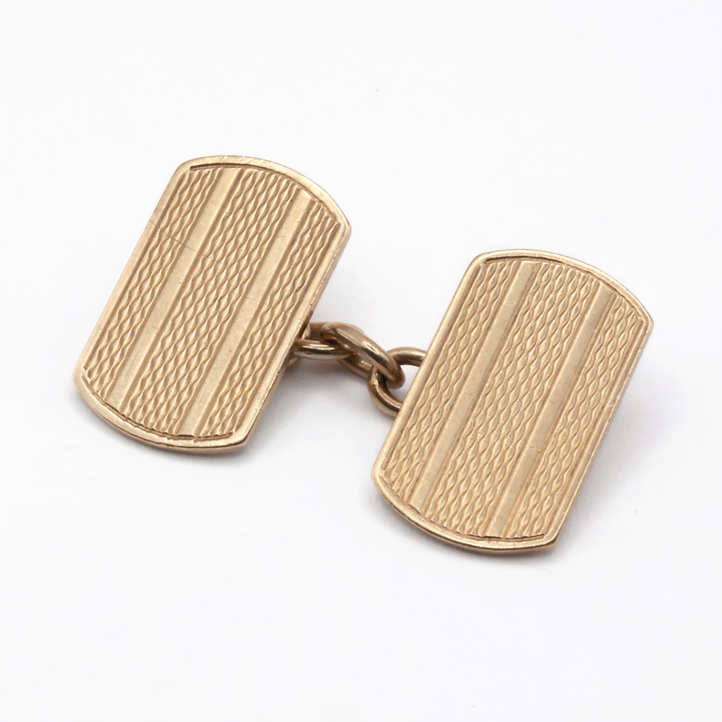 A vintage pair of 9ct gold cuff links.