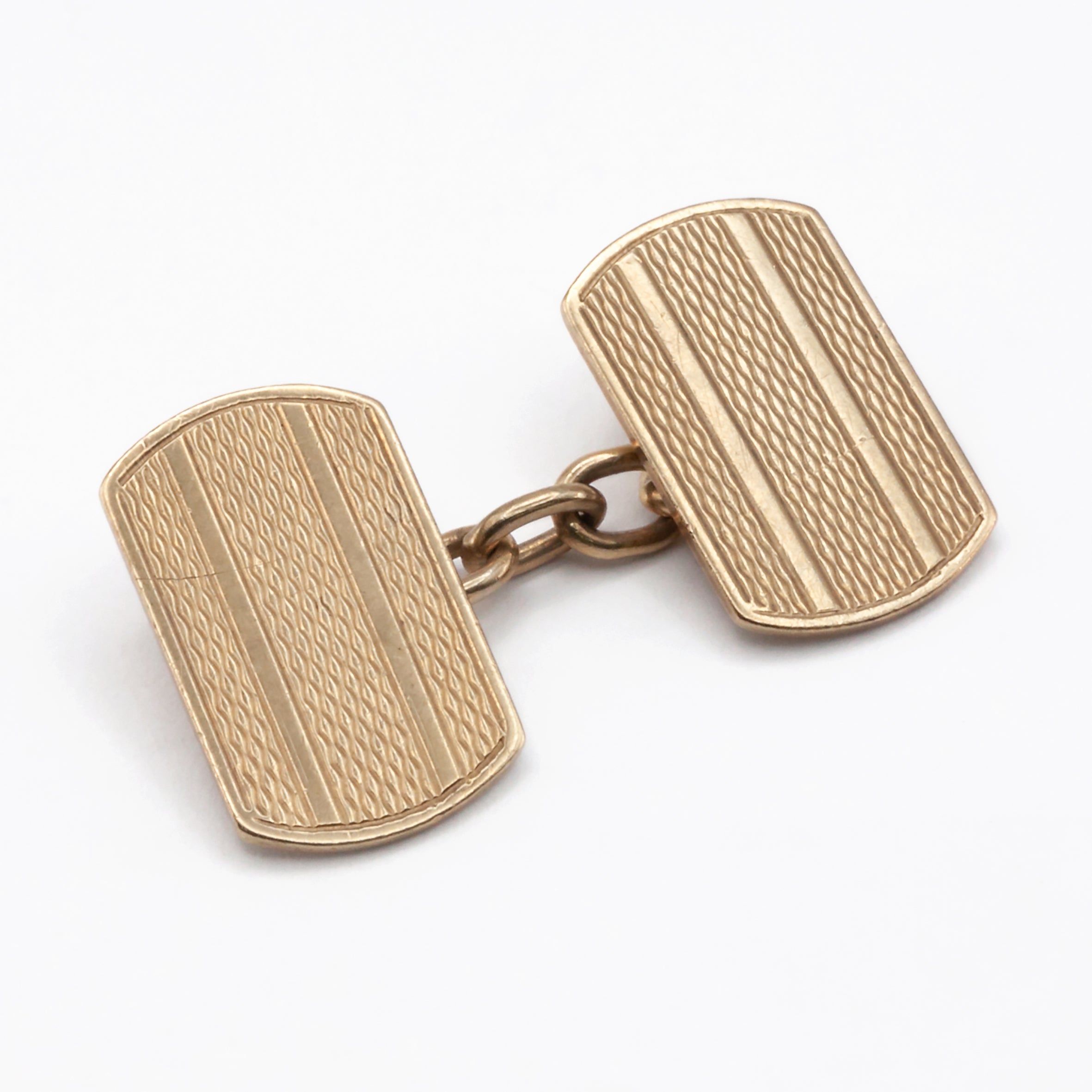 A vintage pair of 9ct gold cuff links.