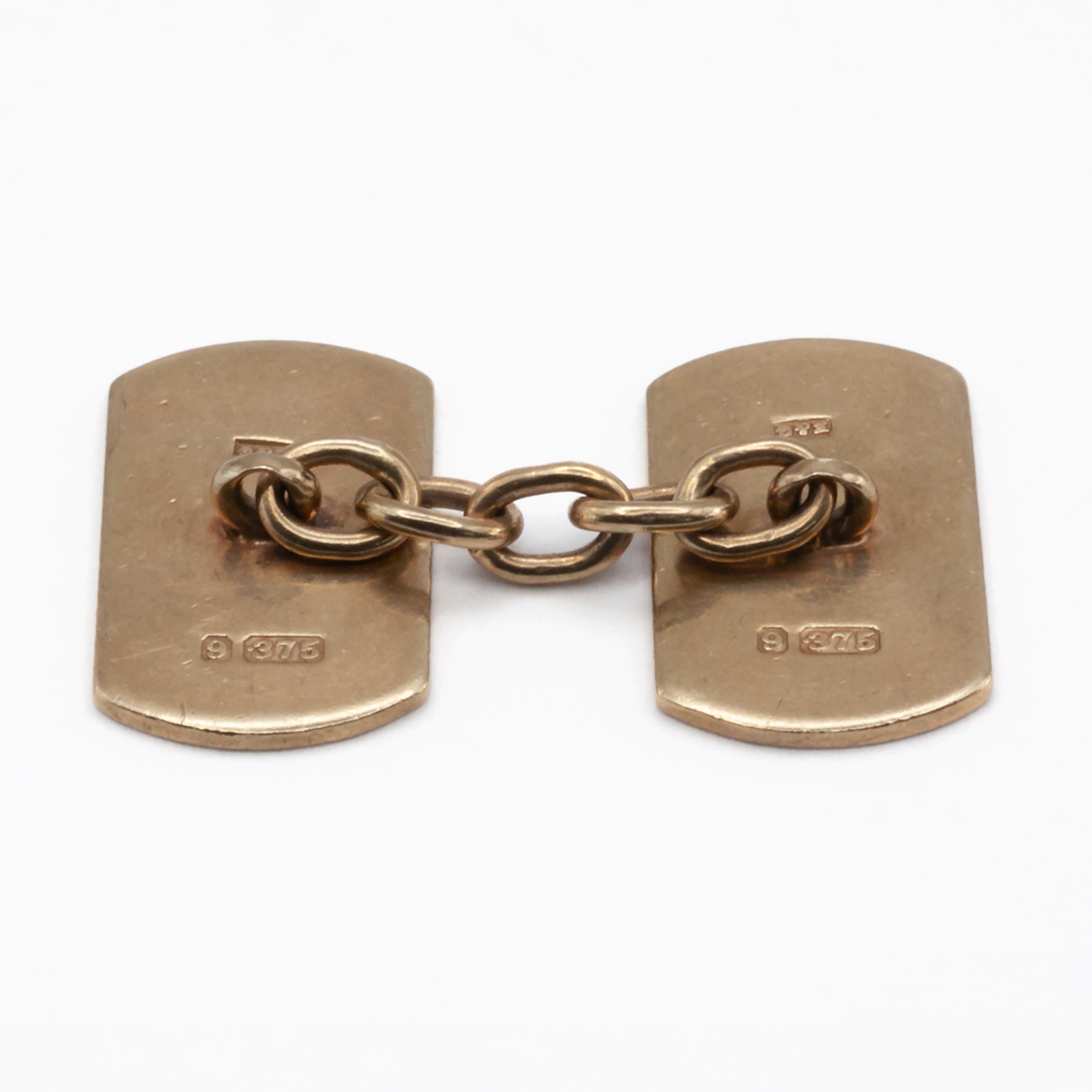 A vintage pair of 9ct gold cuff links.