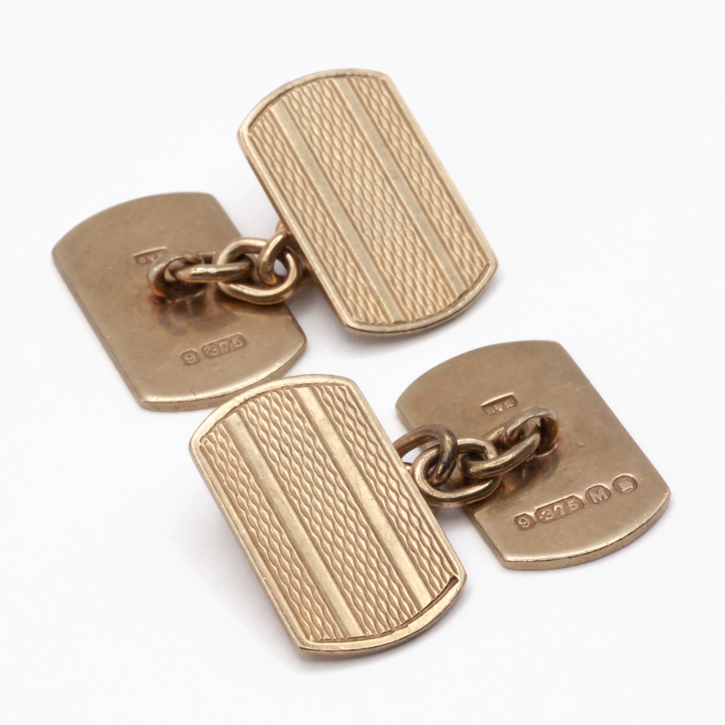 A vintage pair of 9ct gold cuff links.