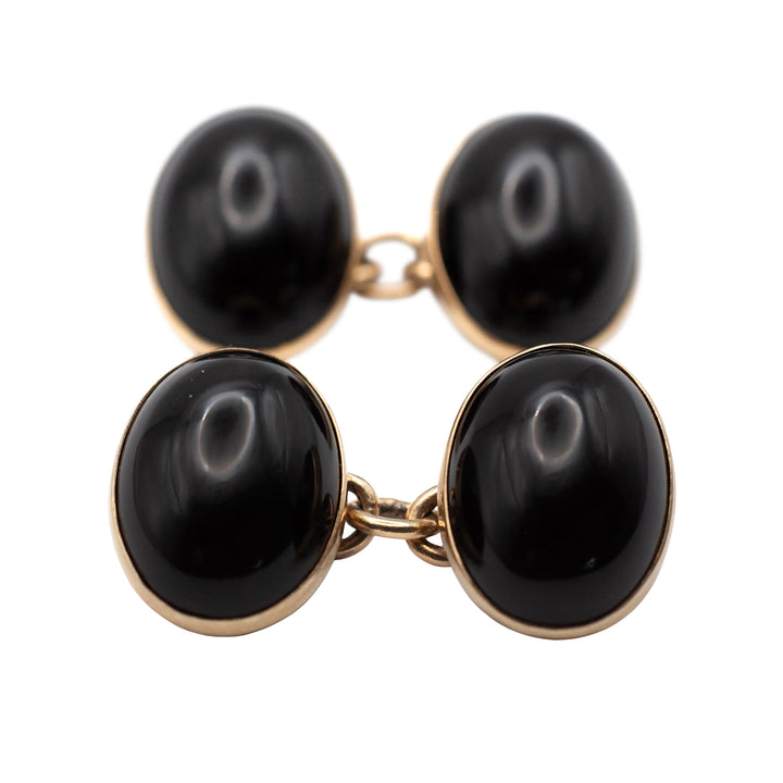 A vintage pair of 9ct gold onyx cuff links