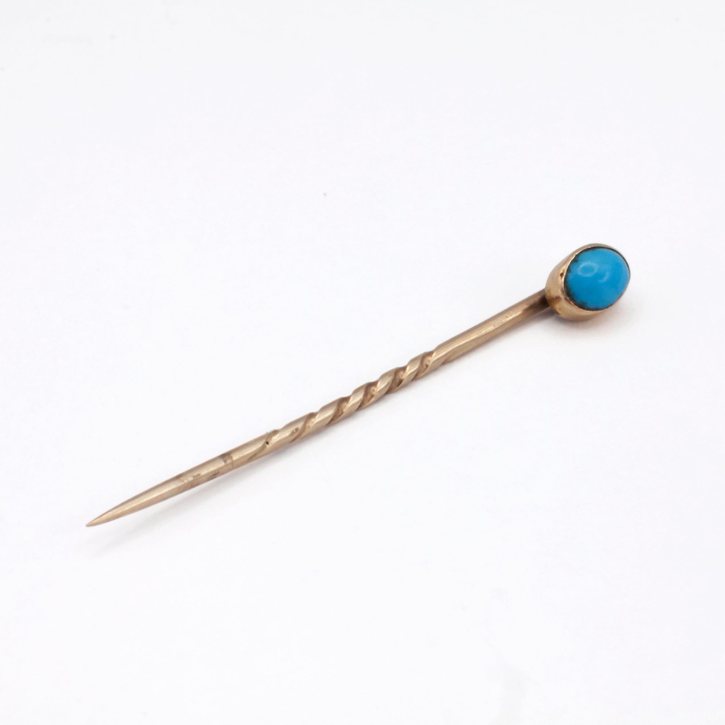 A 9ct gold turquoise tie pin