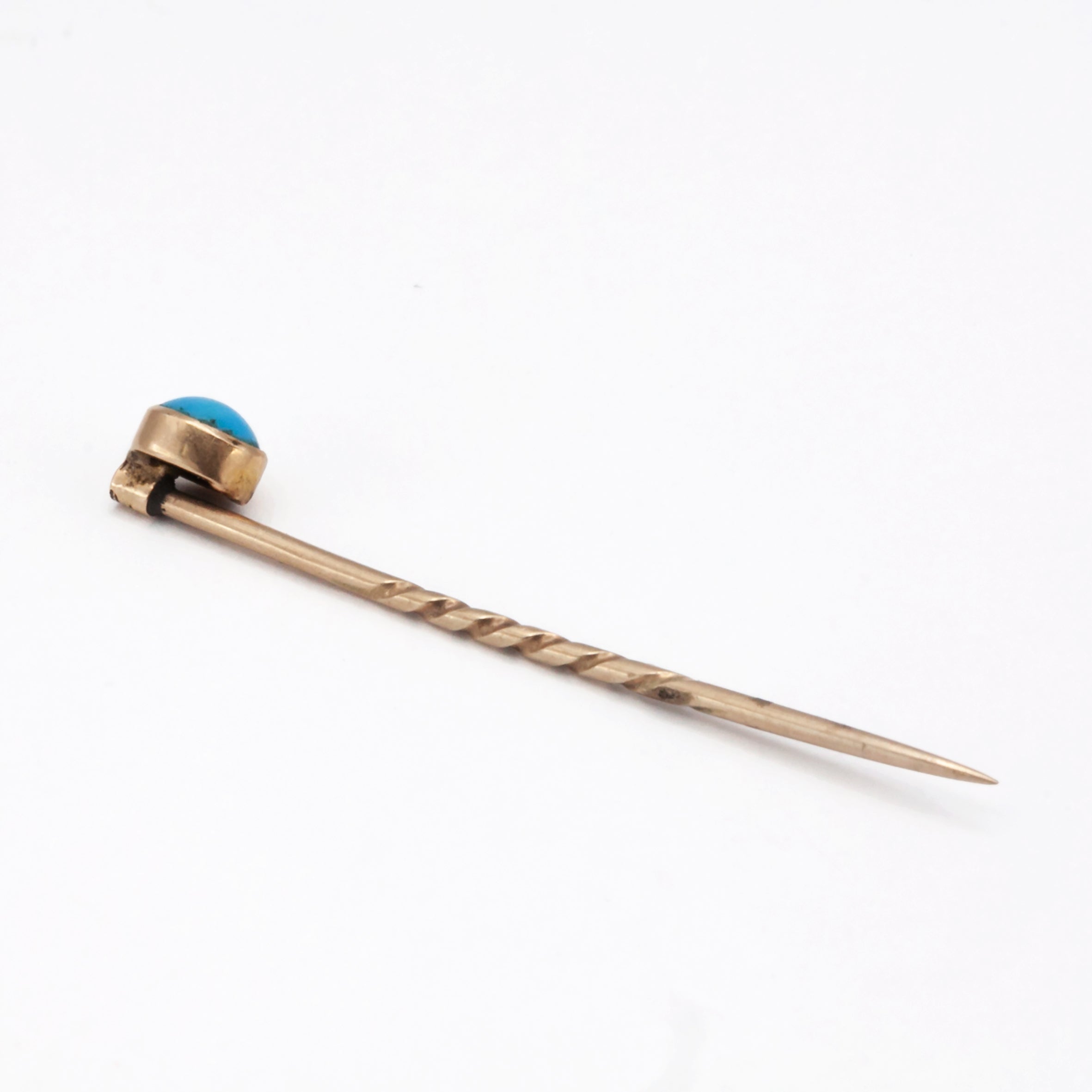 A 9ct gold turquoise tie pin