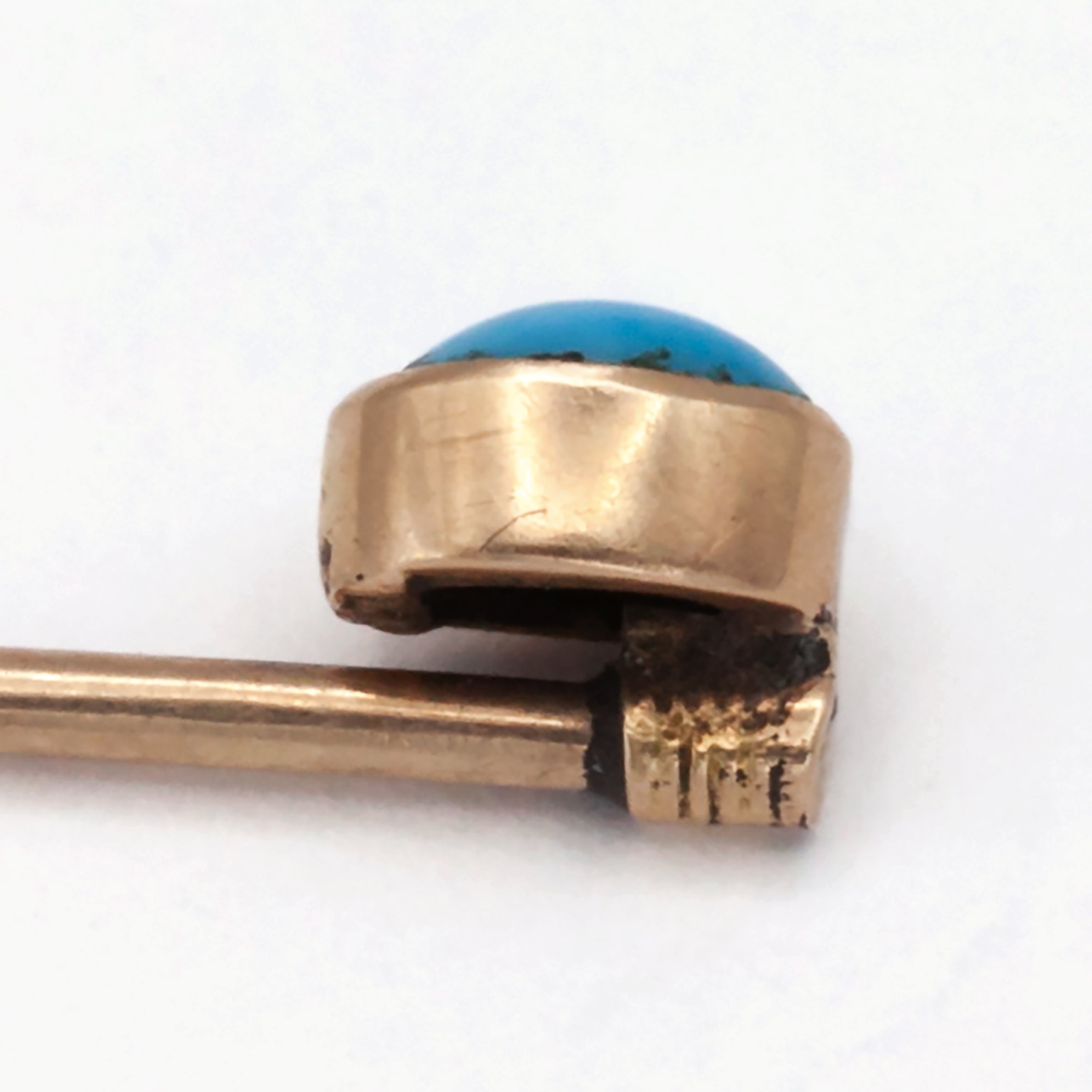 A 9ct gold turquoise tie pin