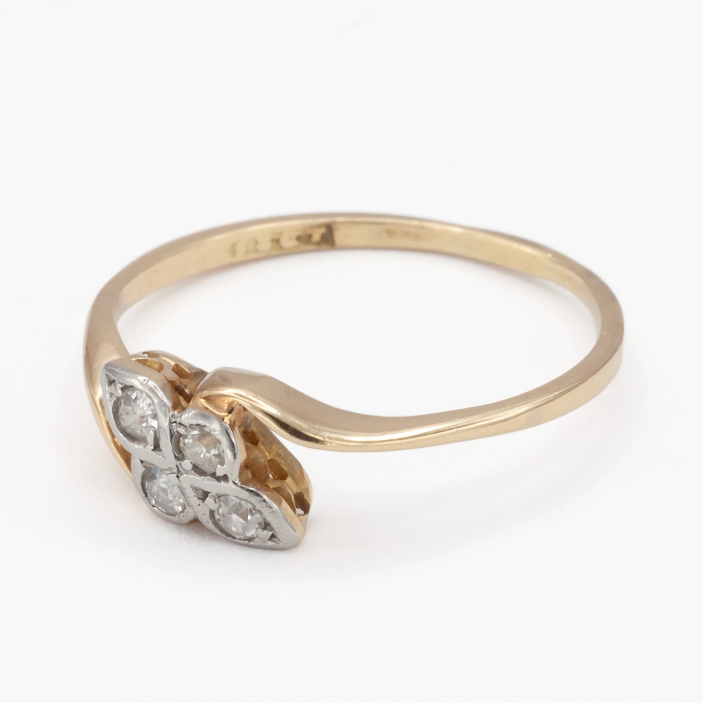 An 18ct gold diamond ring.