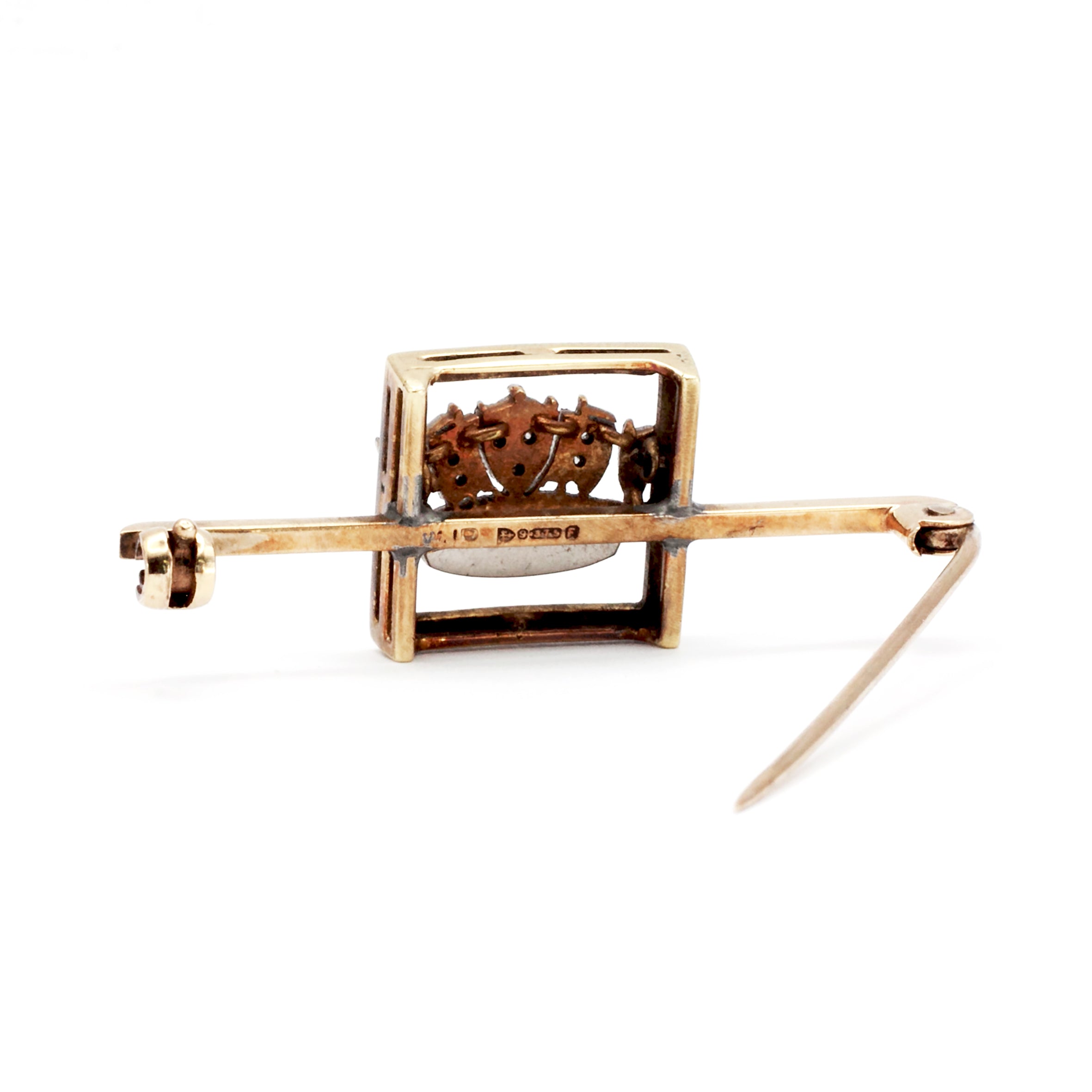 A 9ct gold diamond brooch