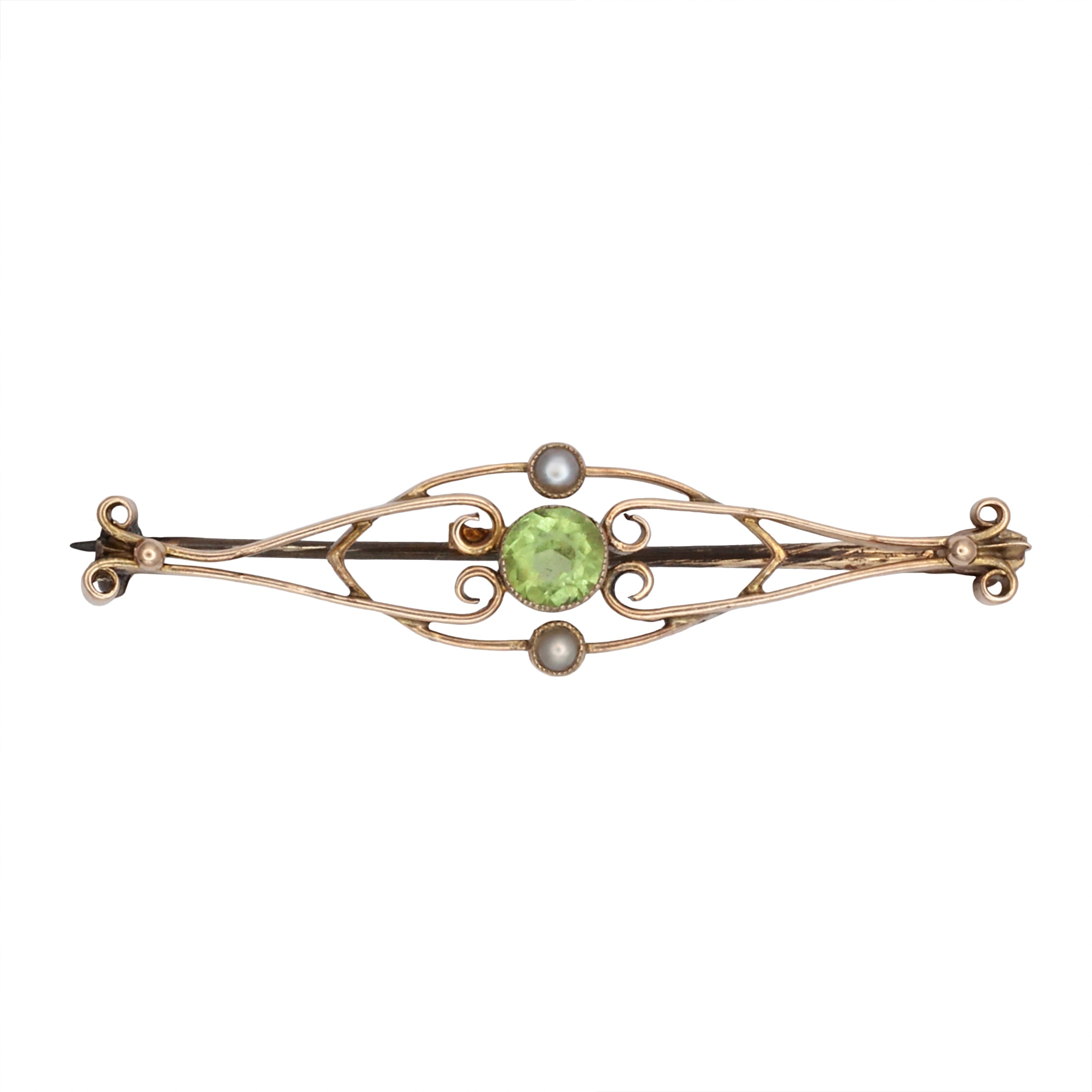 A 9ct gold peridot and seed pearl brooch