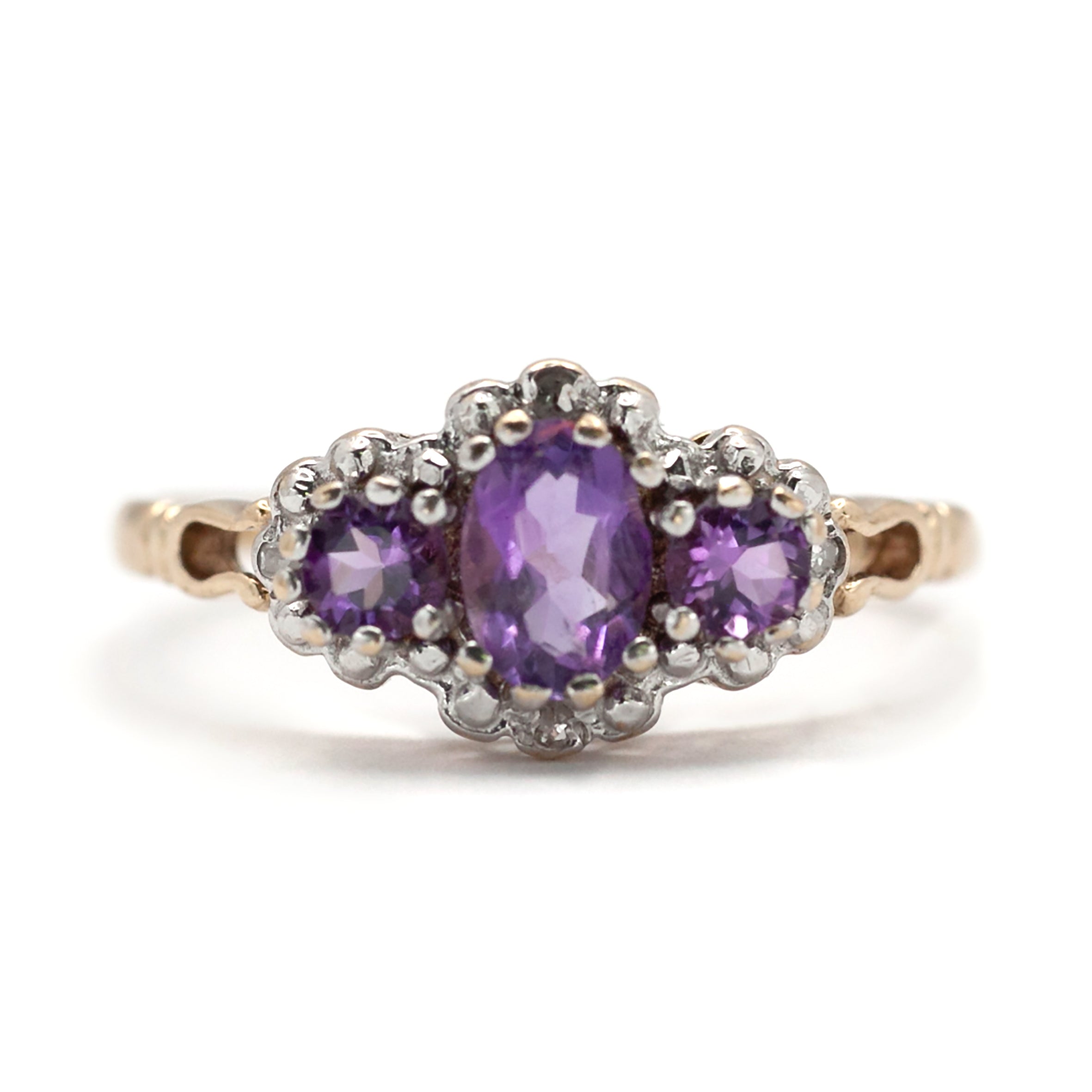 A 9ct gold amethyst and diamond ring