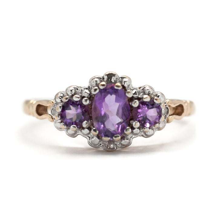 A 9ct gold amethyst and diamond ring