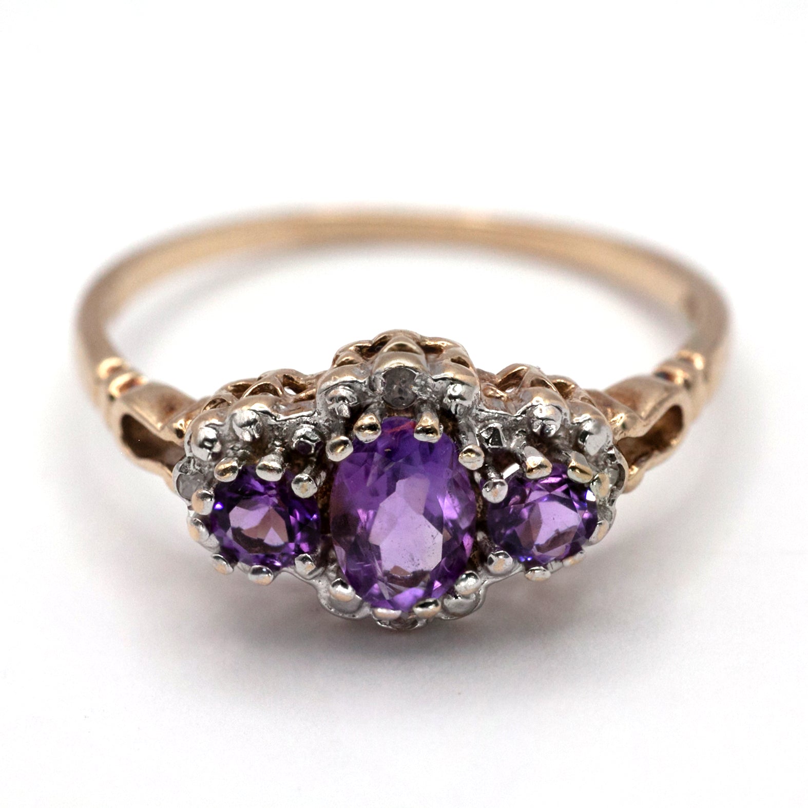 A 9ct gold amethyst and diamond ring