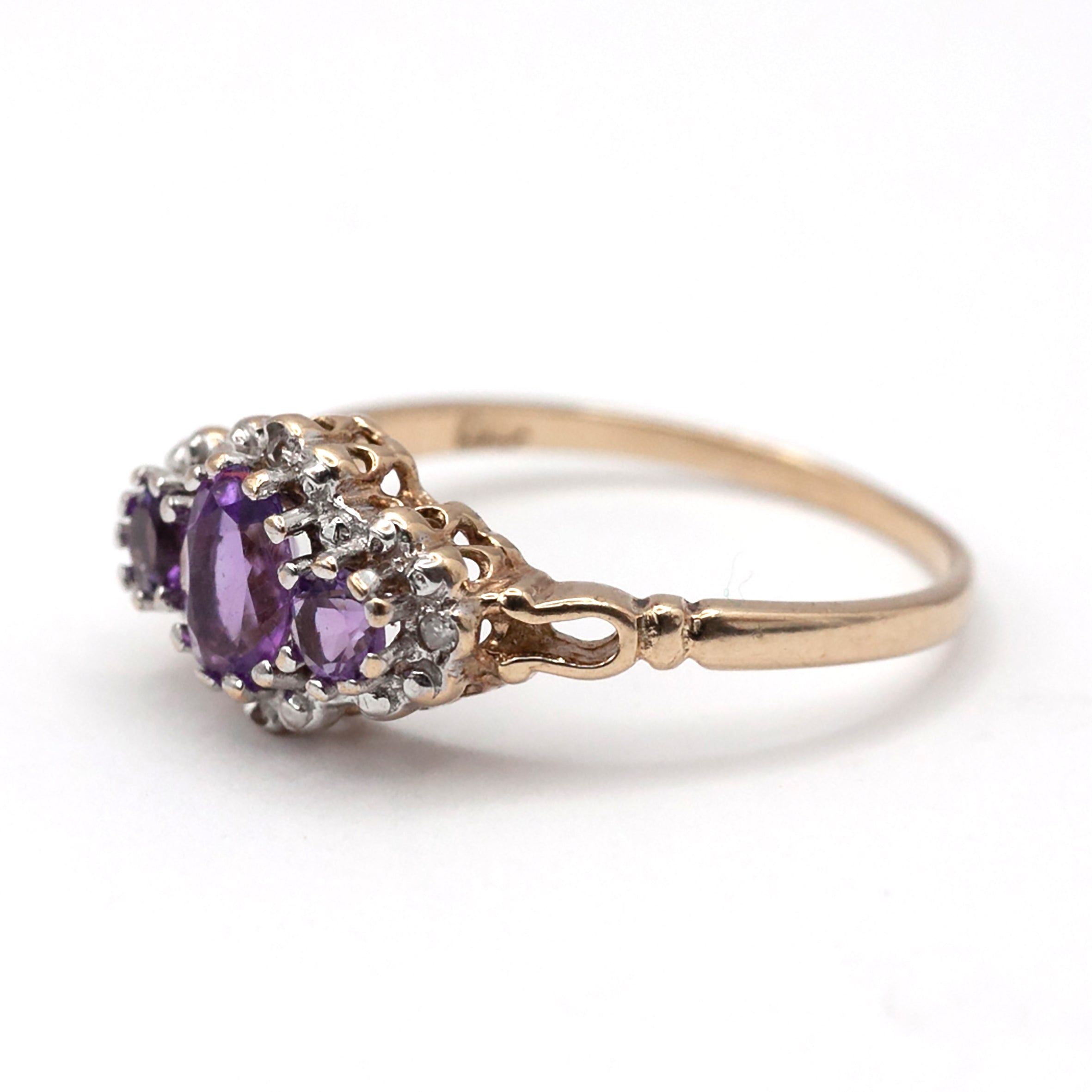 A 9ct gold amethyst and diamond ring