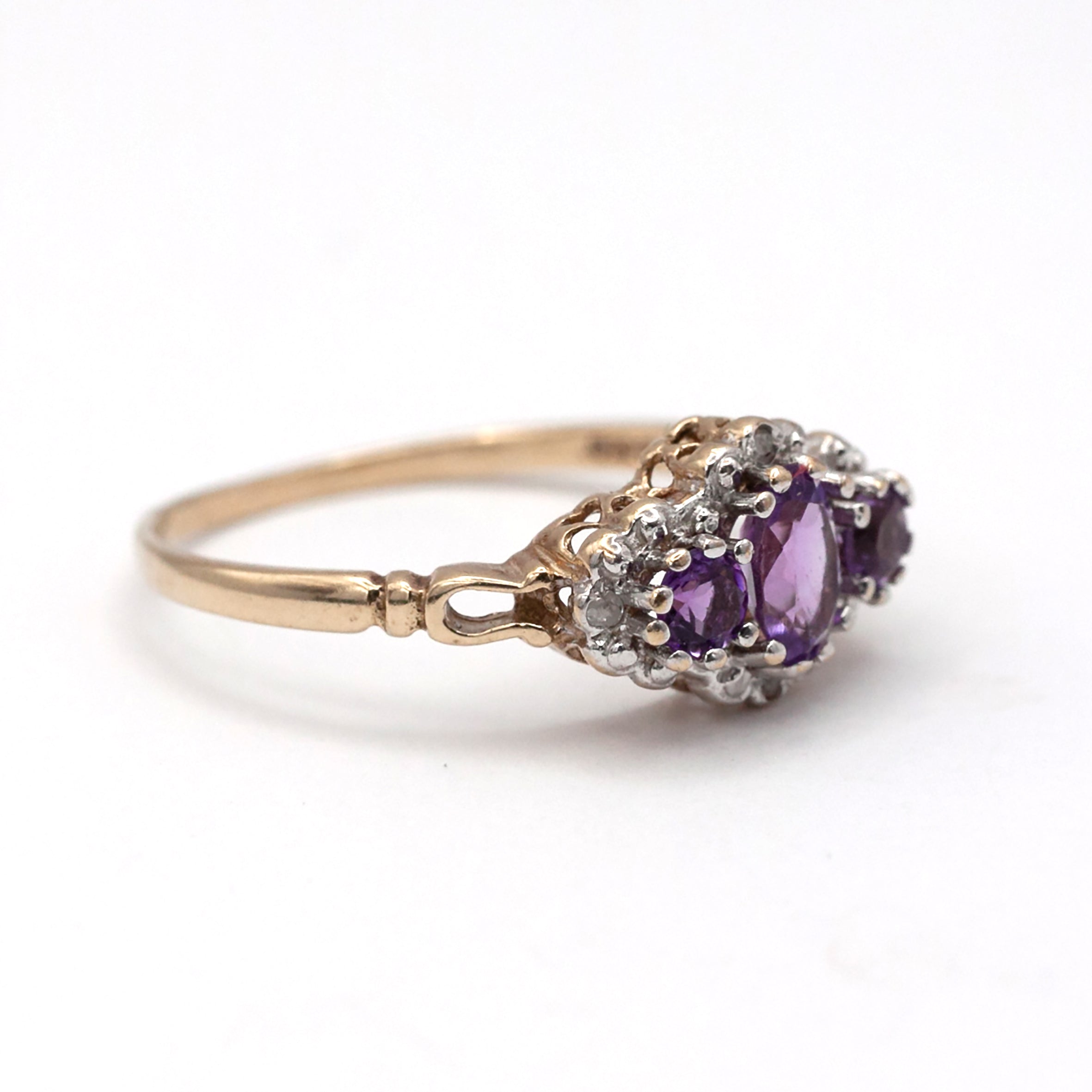 A 9ct gold amethyst and diamond ring