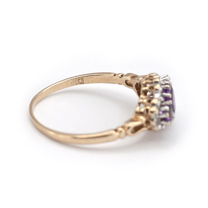 A 9ct gold amethyst and diamond ring