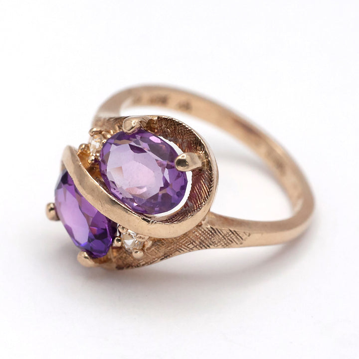 A 9ct gold pink topaz and spinel ring