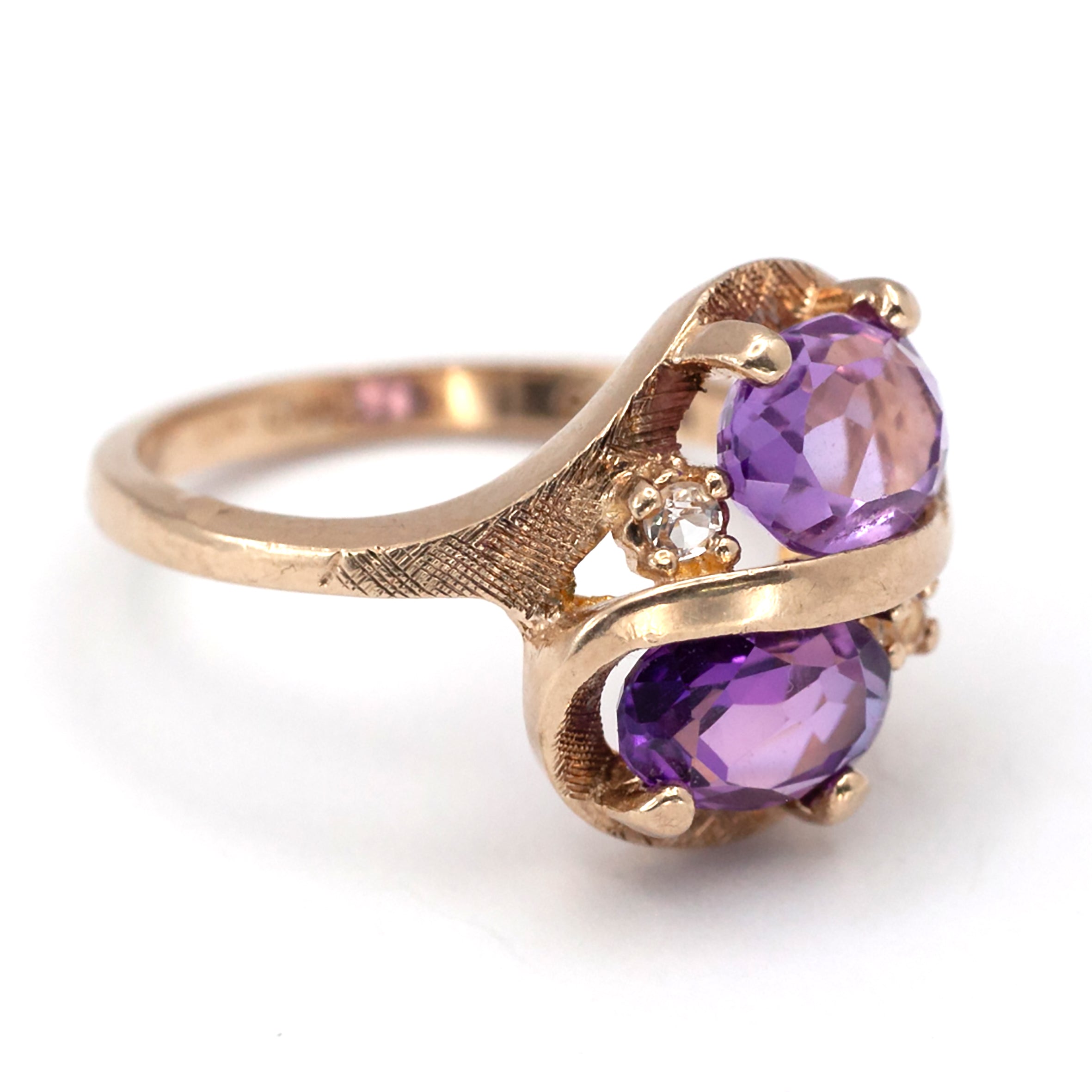A 9ct gold pink topaz and spinel ring