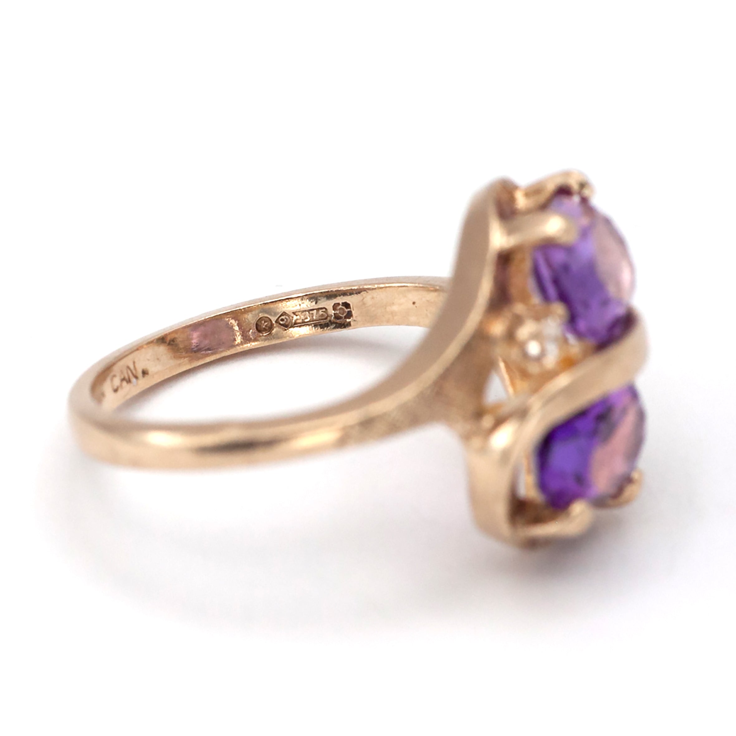 A 9ct gold pink topaz and spinel ring
