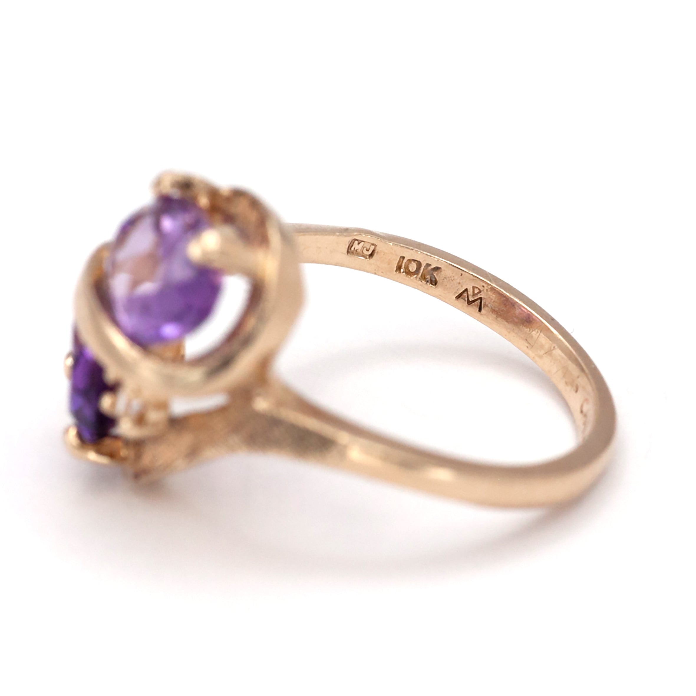 A 9ct gold pink topaz and spinel ring