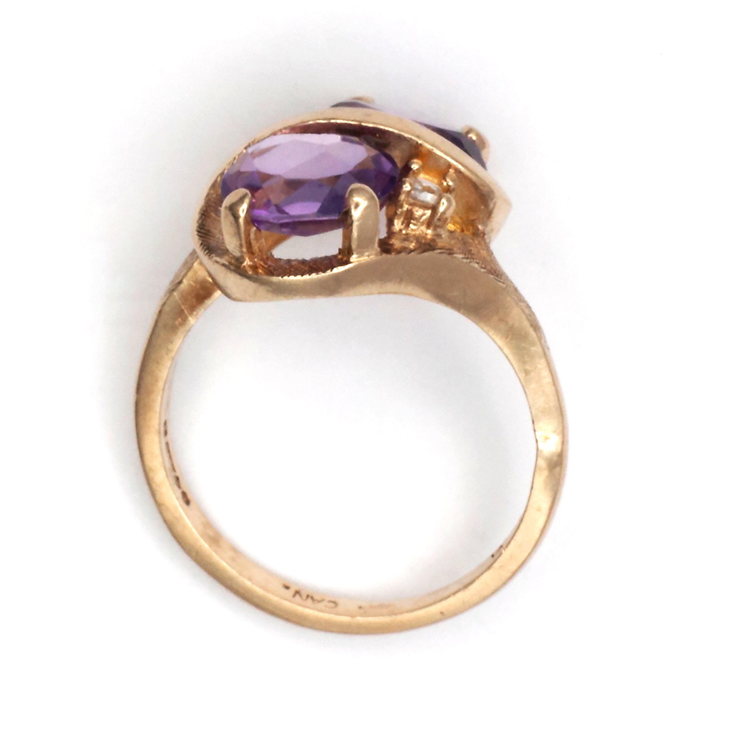 A 9ct gold pink topaz and spinel ring