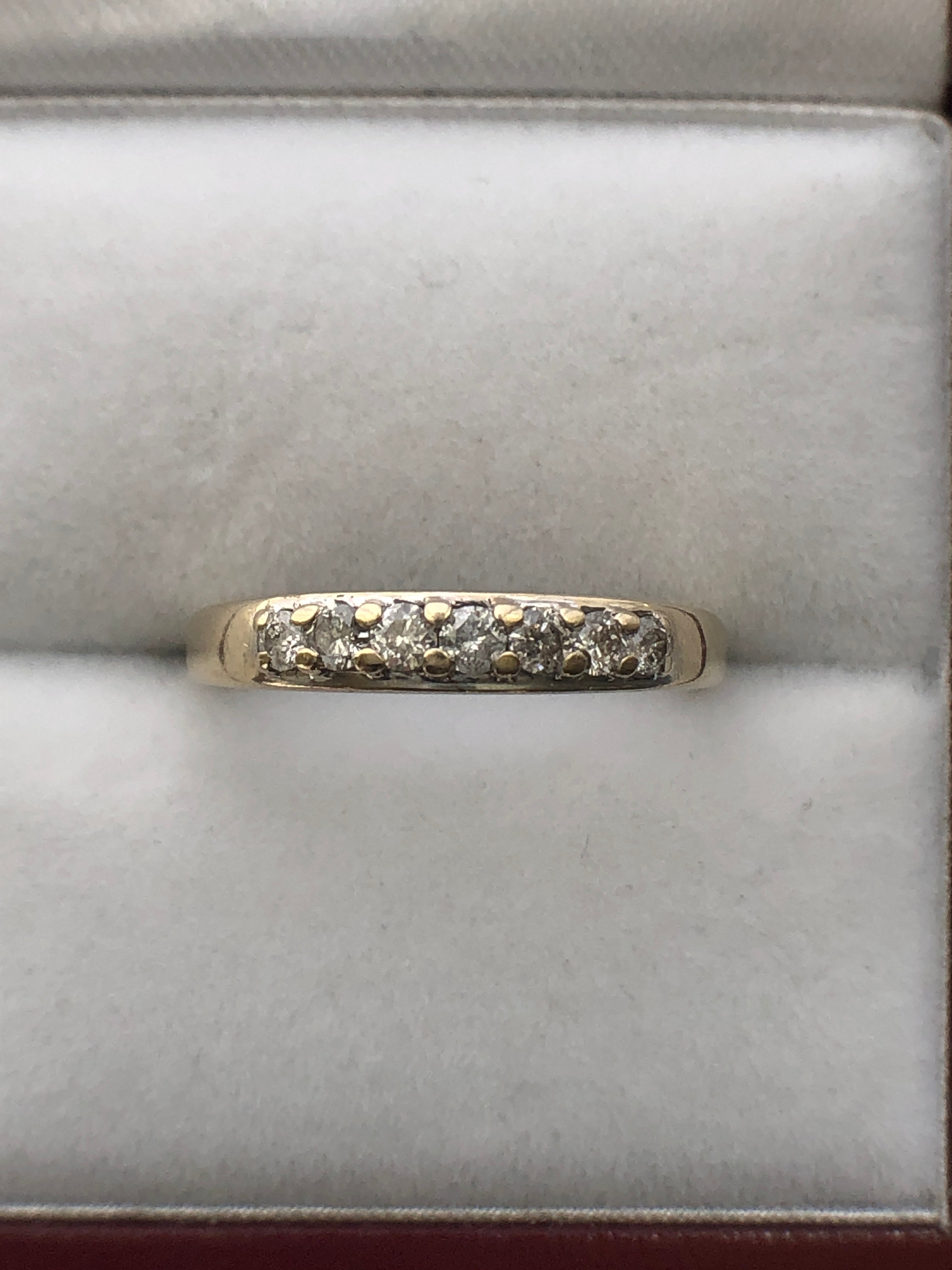 An 18ct gold diamond seven stone ring