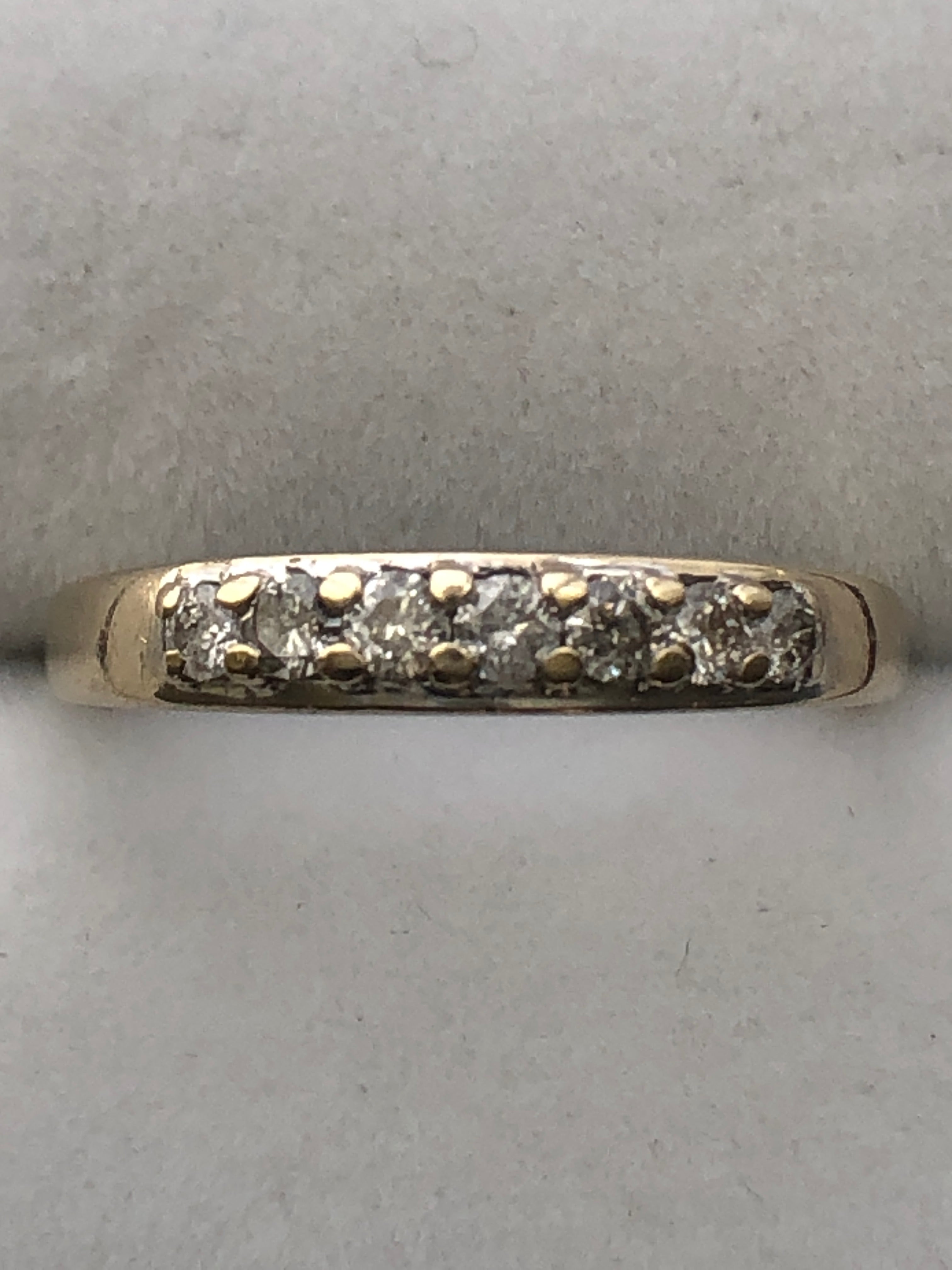 An 18ct gold diamond seven stone ring