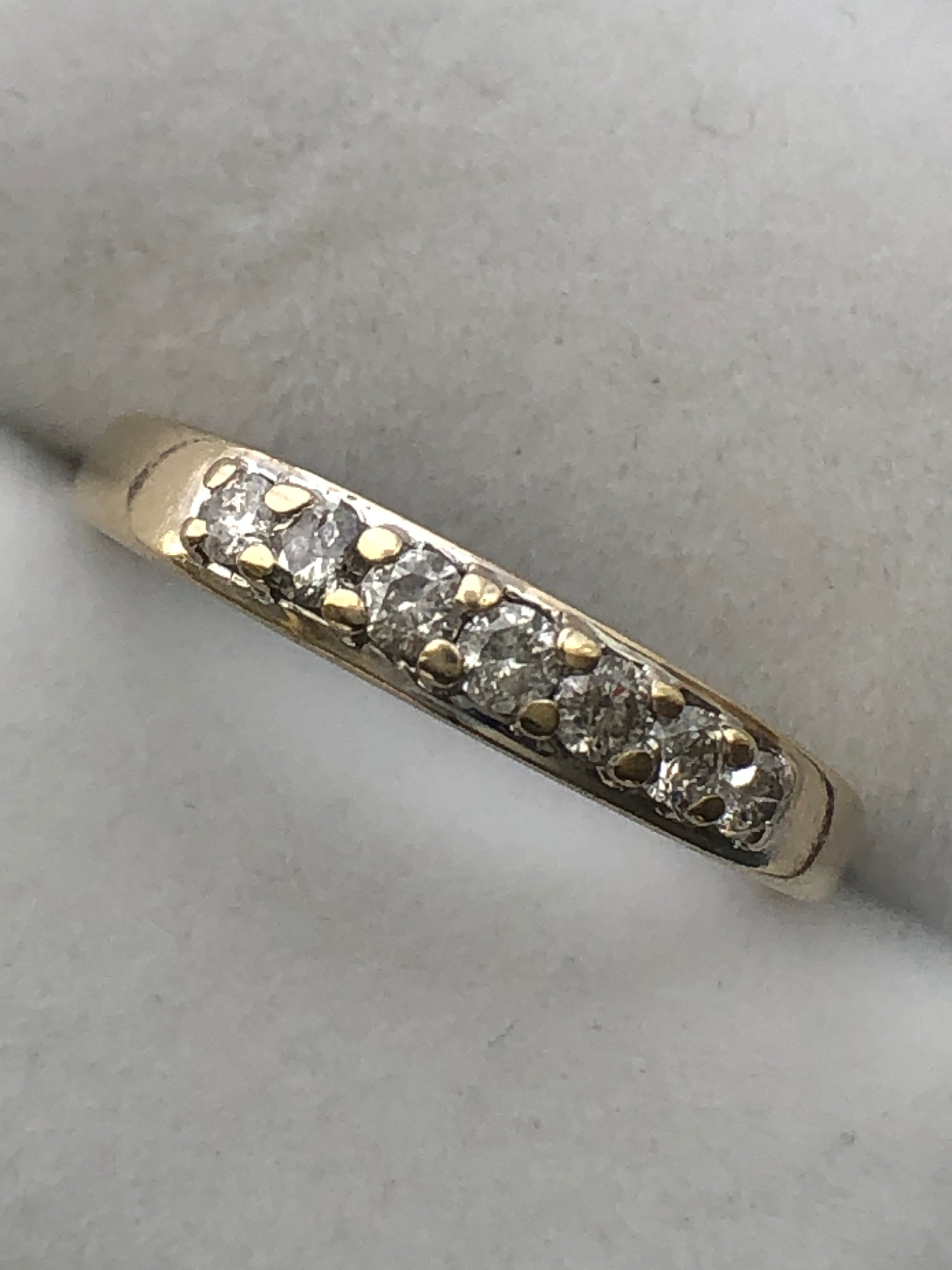 An 18ct gold diamond seven stone ring