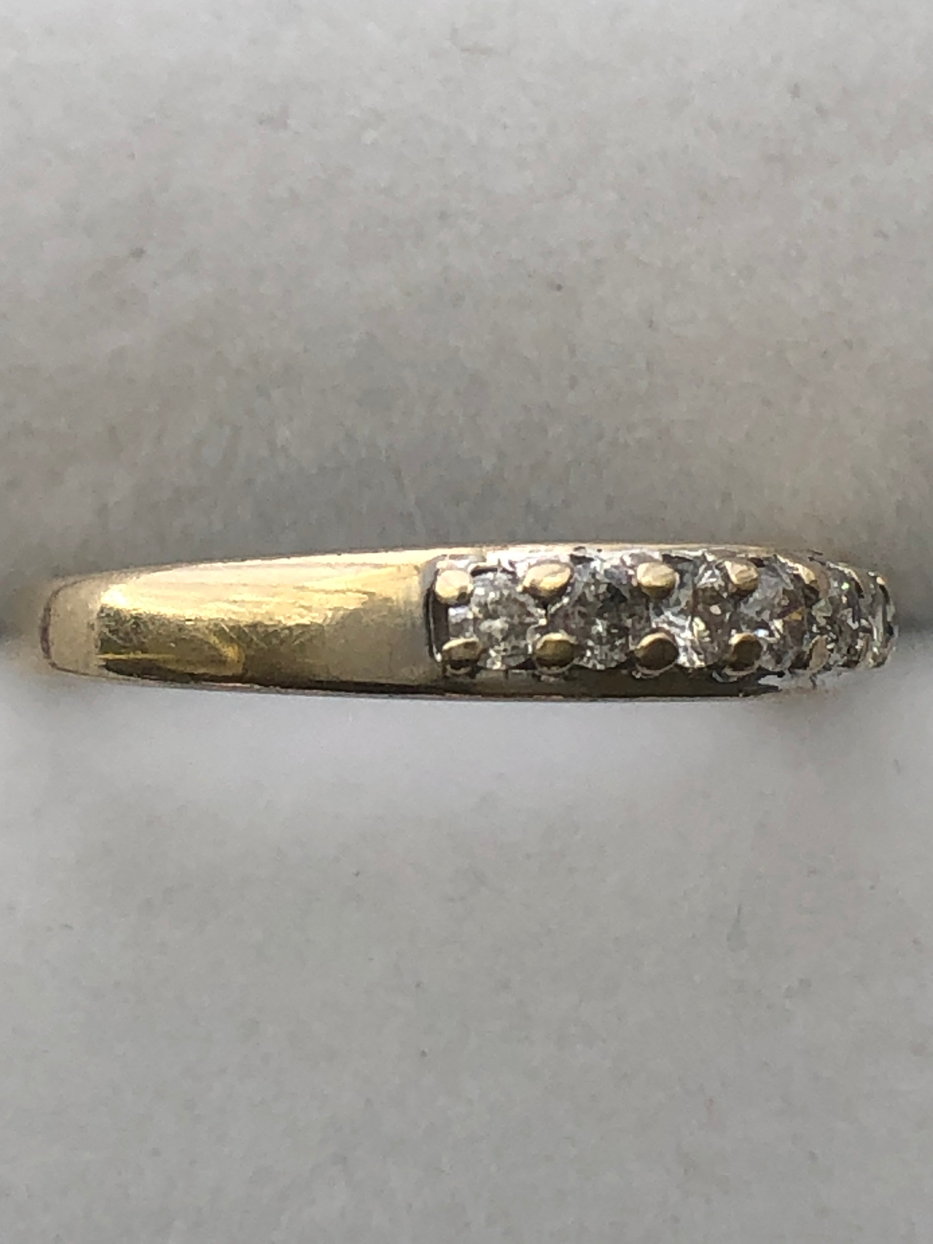 An 18ct gold diamond seven stone ring
