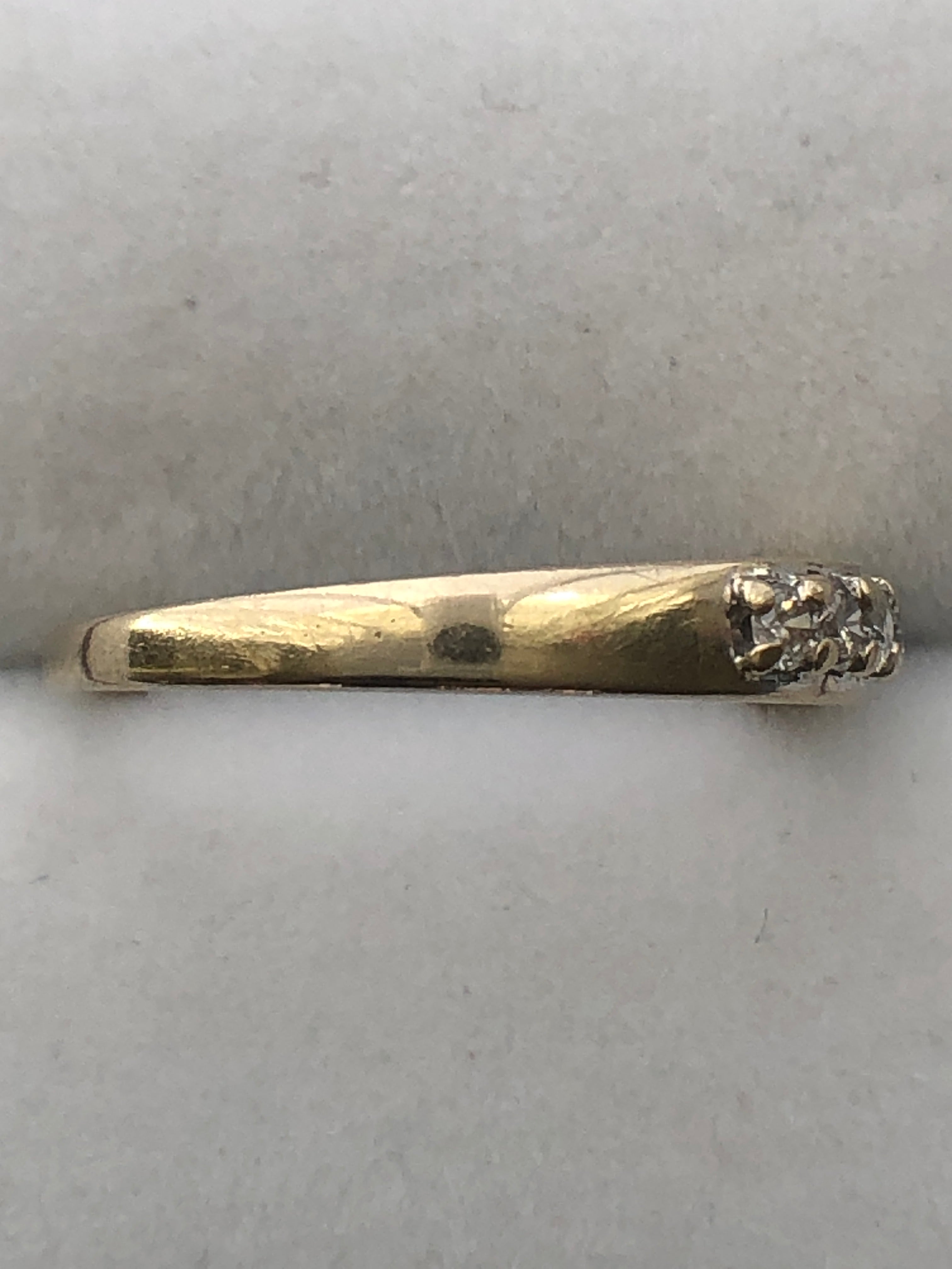 An 18ct gold diamond seven stone ring