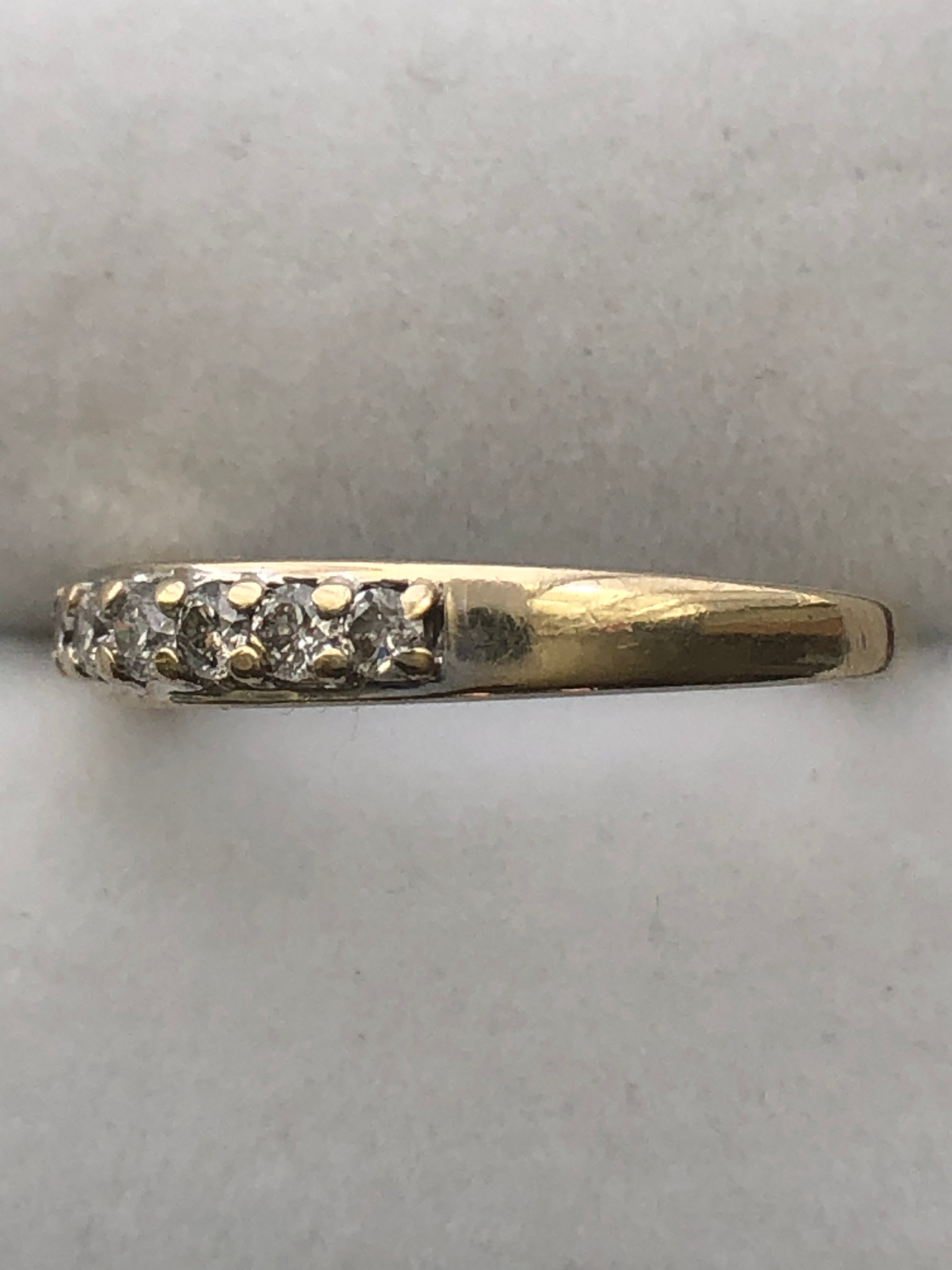 An 18ct gold diamond seven stone ring