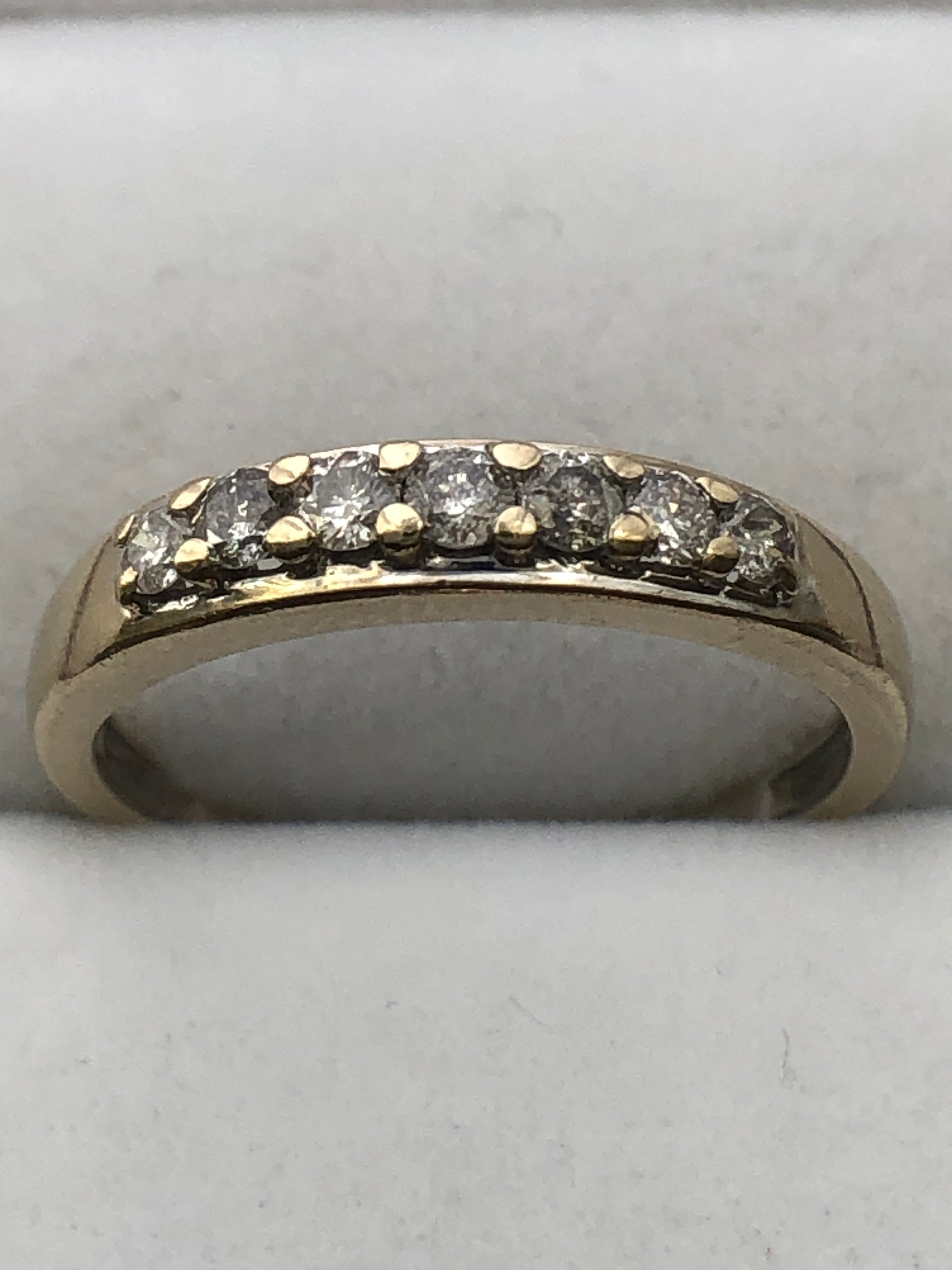 An 18ct gold diamond seven stone ring