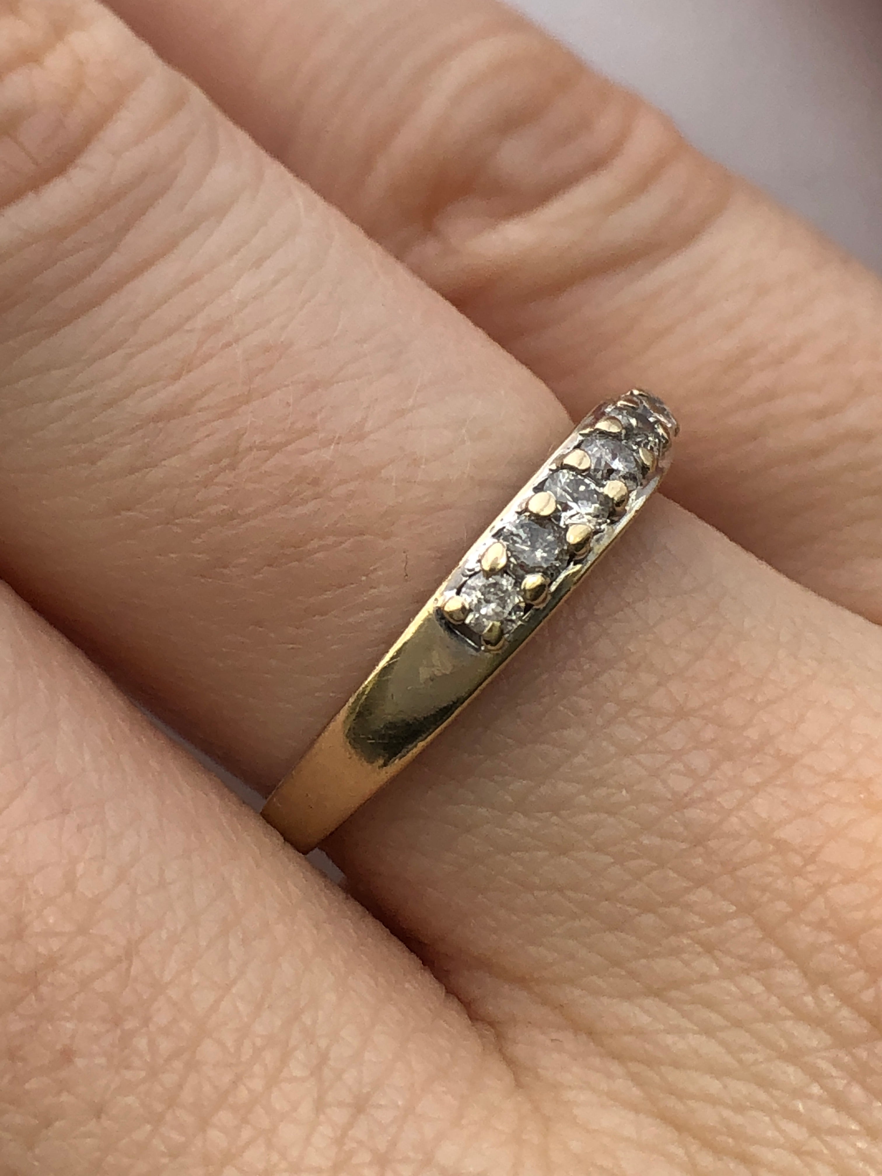An 18ct gold diamond seven stone ring